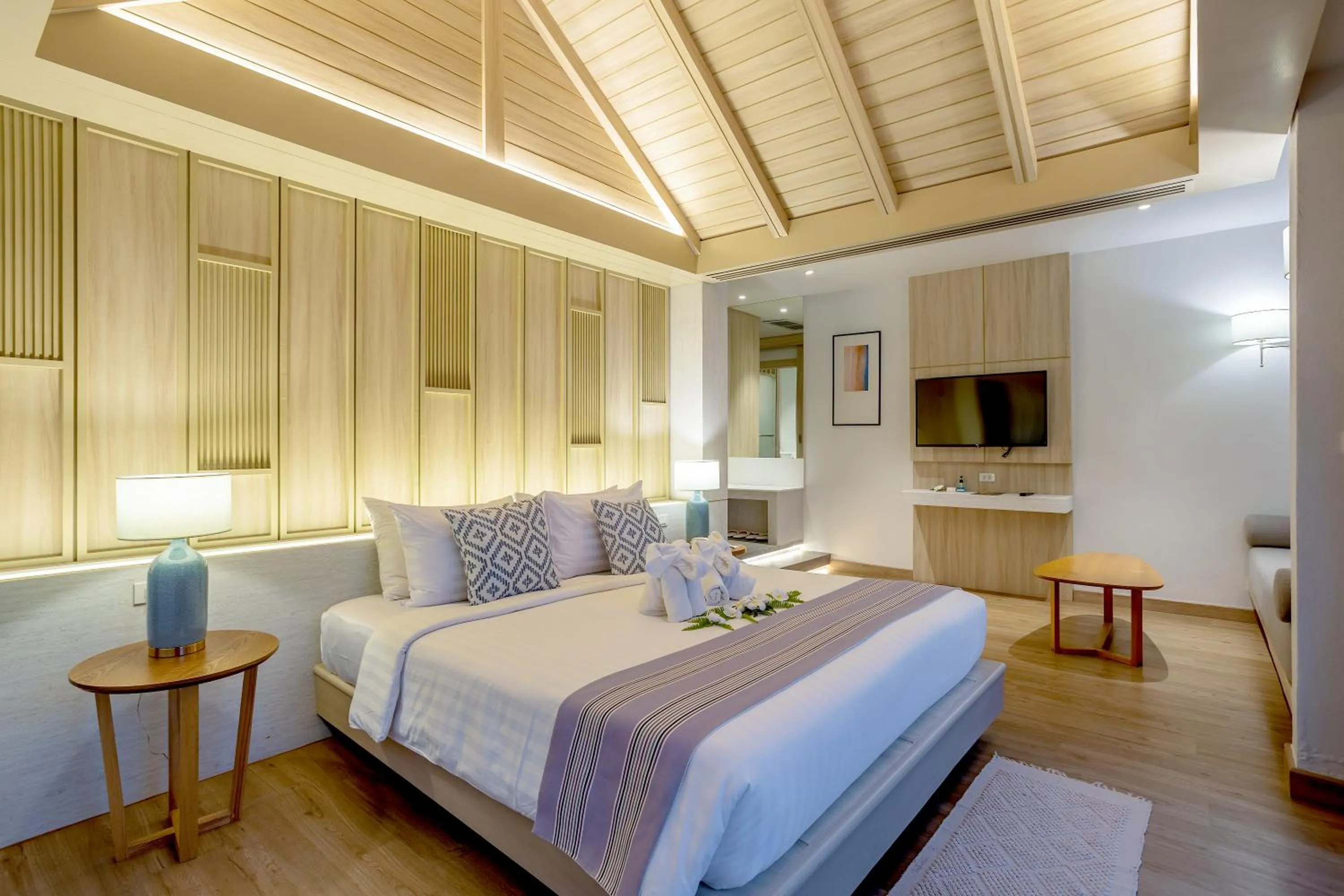 Bed in Namaka Resort Kamala