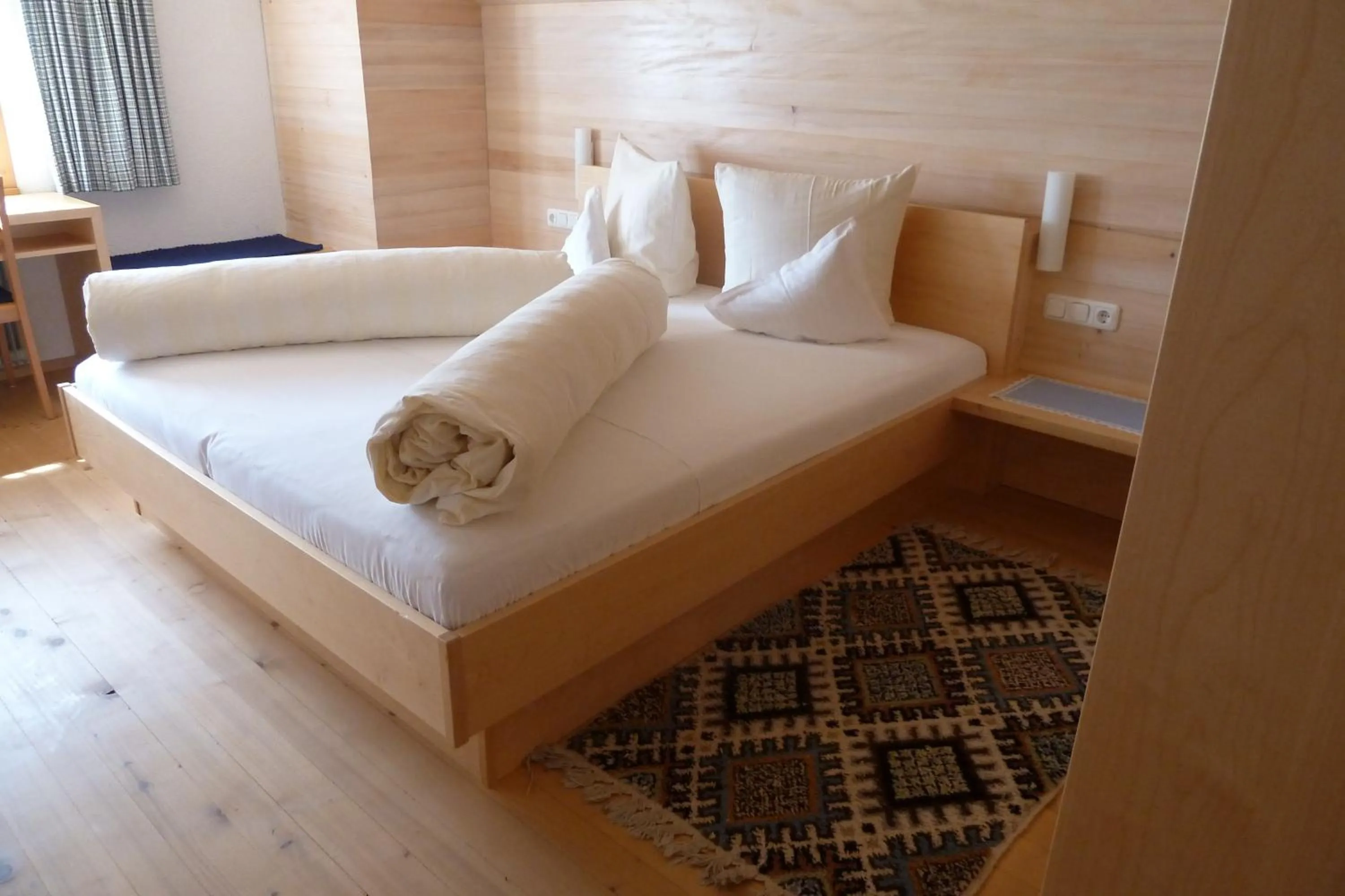 Bed in Hotel Tannahof