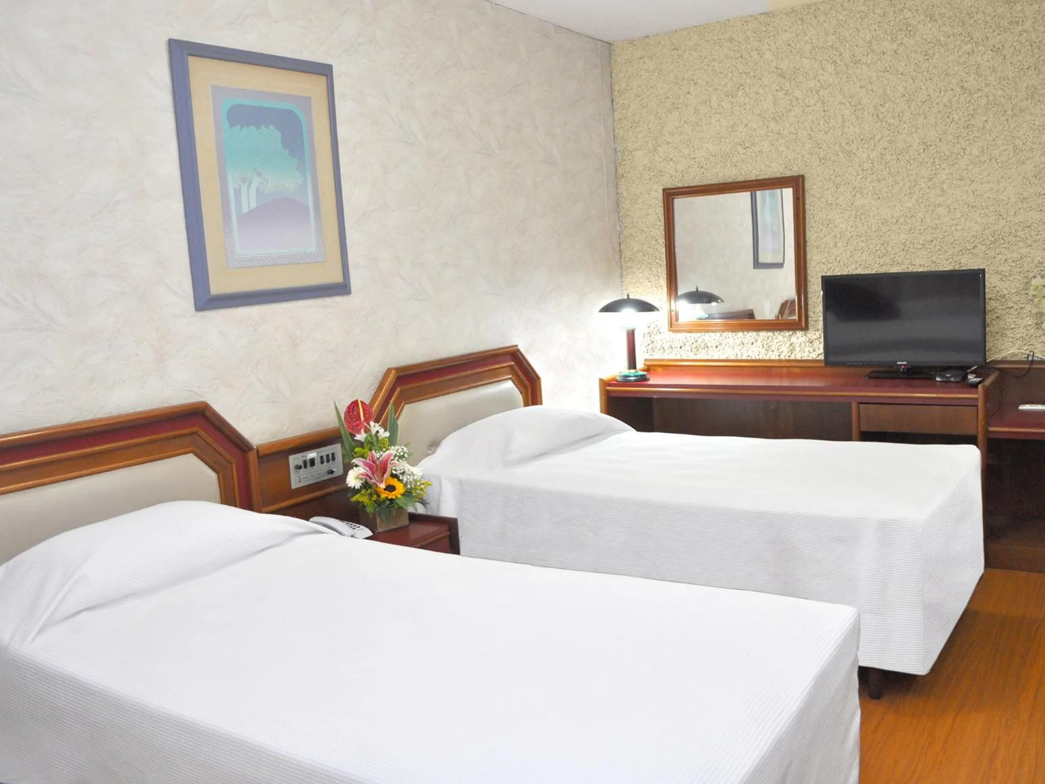 Bed in Caravelle Palace Hotel