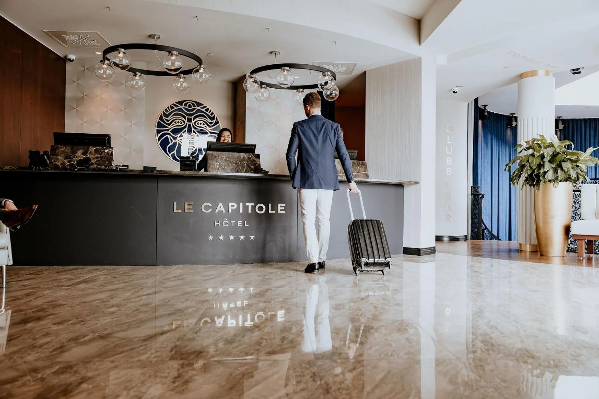 Lobby or reception in Le Capitole Hotel