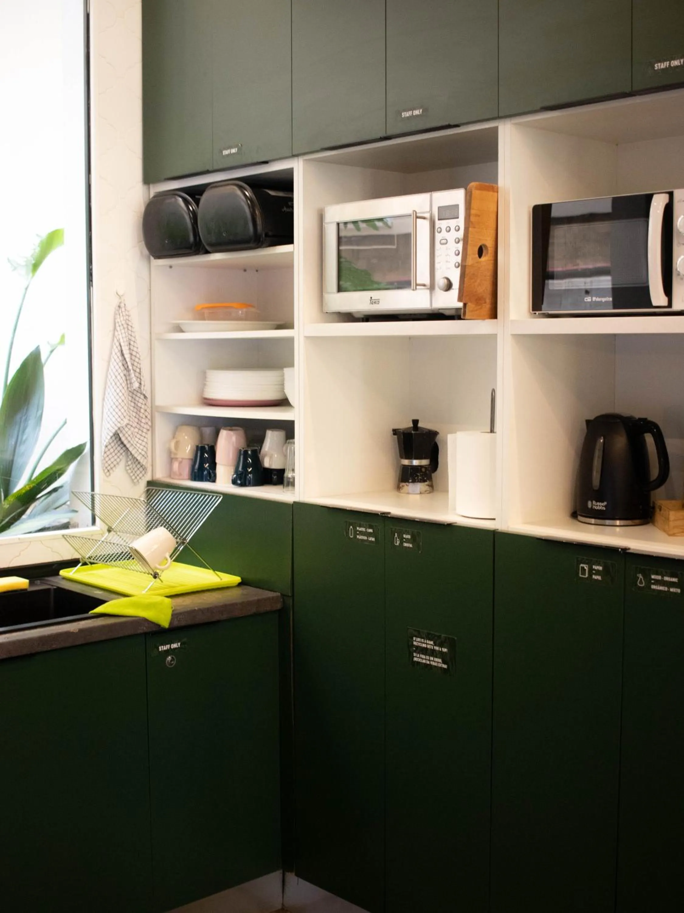 Communal kitchen in 2060 The Newton Hostel