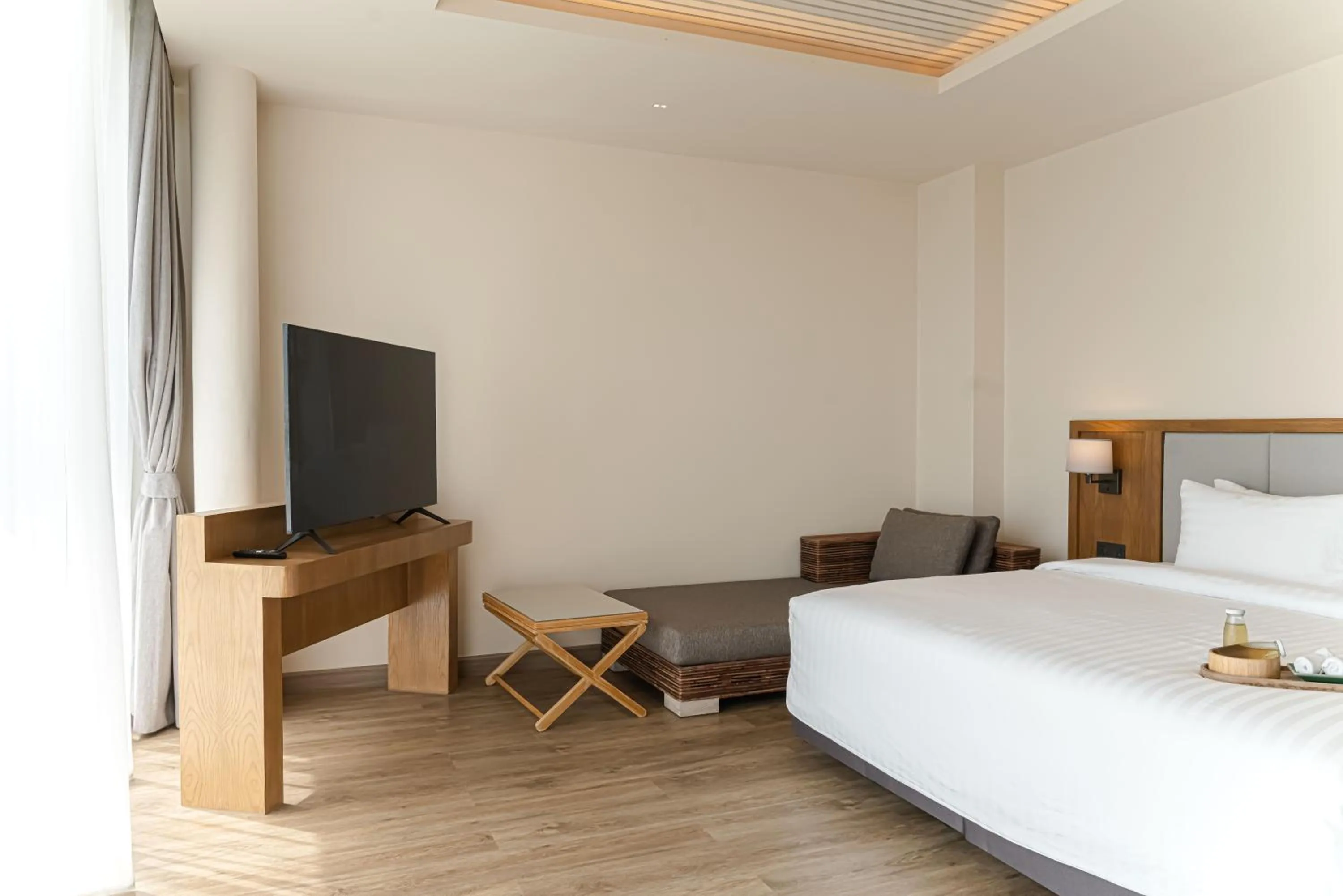 Bed in Baan Haad Ngam Boutique Resort