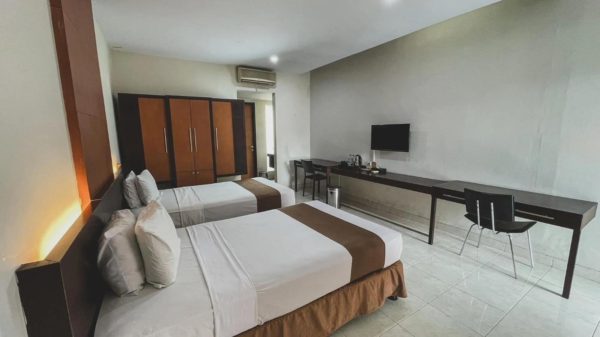 Bed in LPP Convention Hotel Demangan