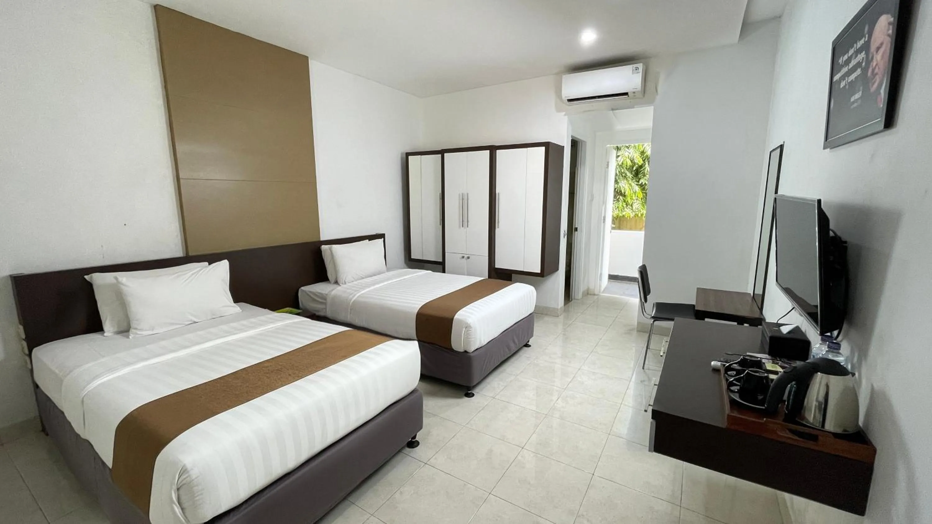 Bed in LPP Convention Hotel Demangan