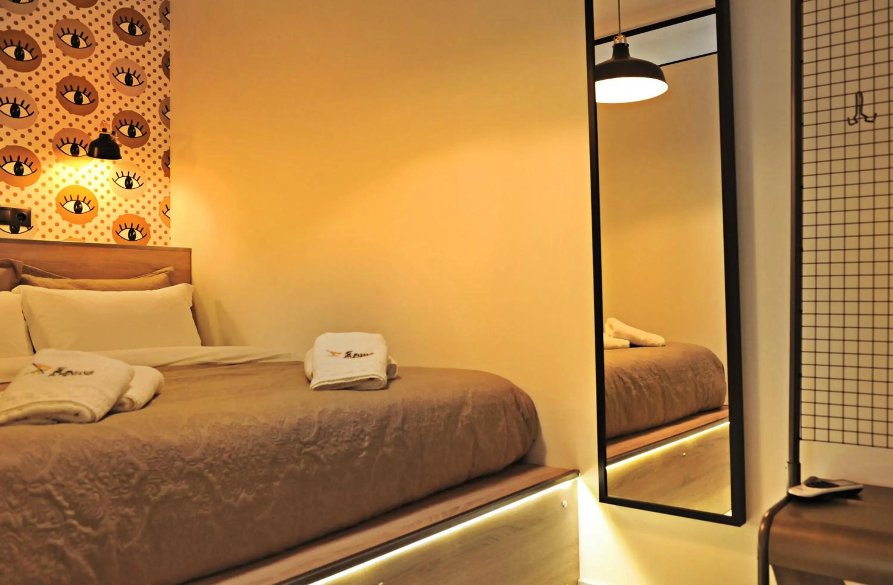 Bed in The Athenians Modern Apartments