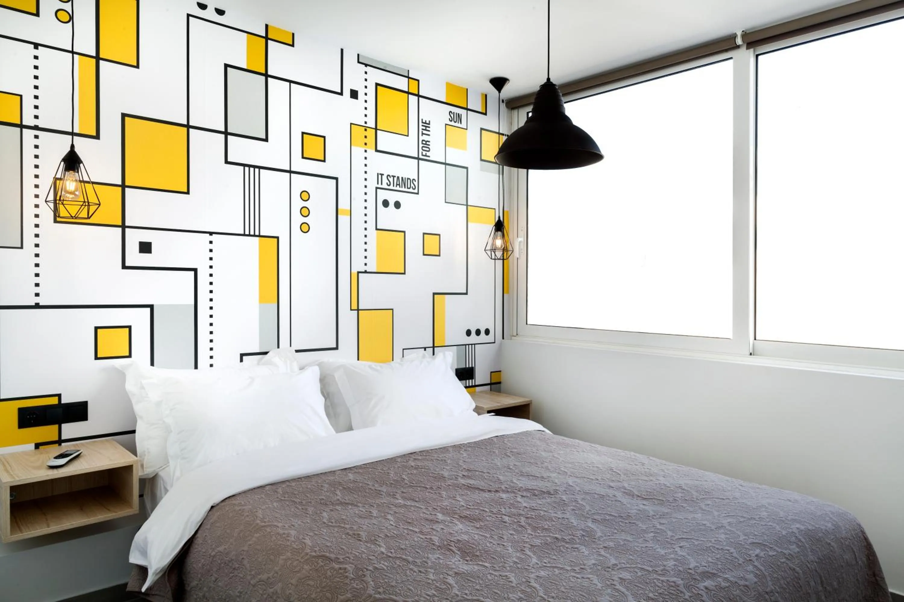 Bed in The Athenians Modern Apartments