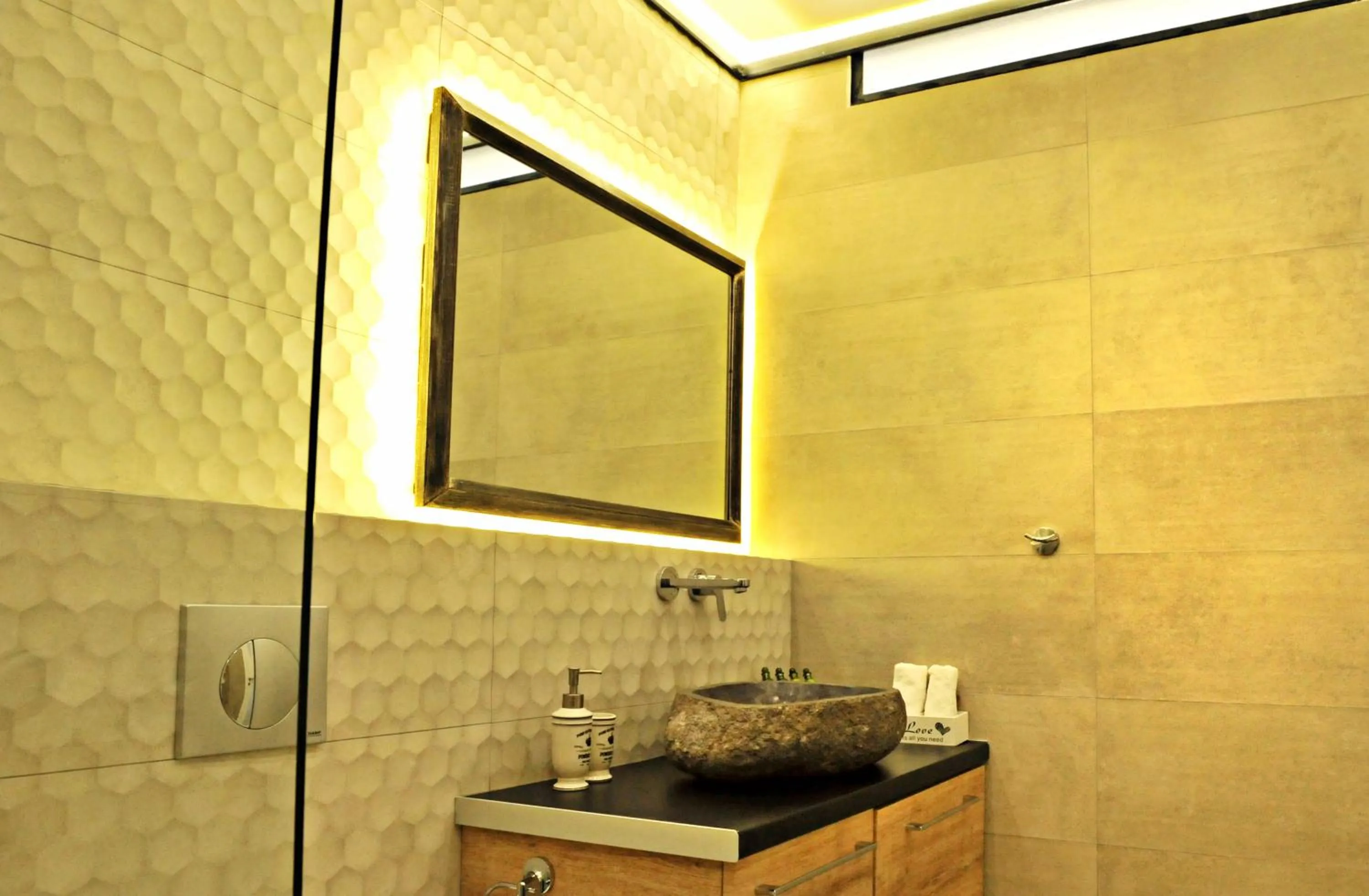 Bathroom in The Athenians Modern Apartments