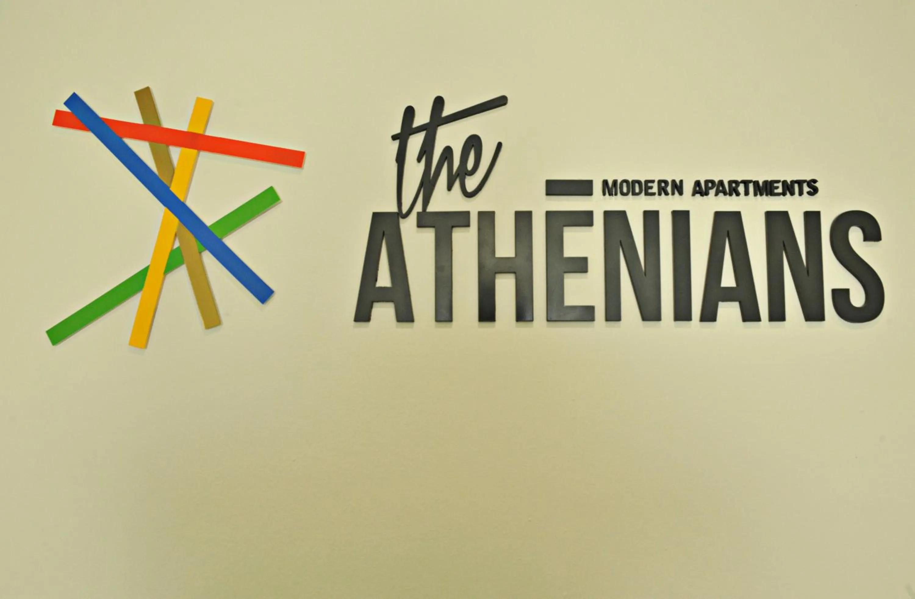 Property logo or sign in The Athenians Modern Apartments