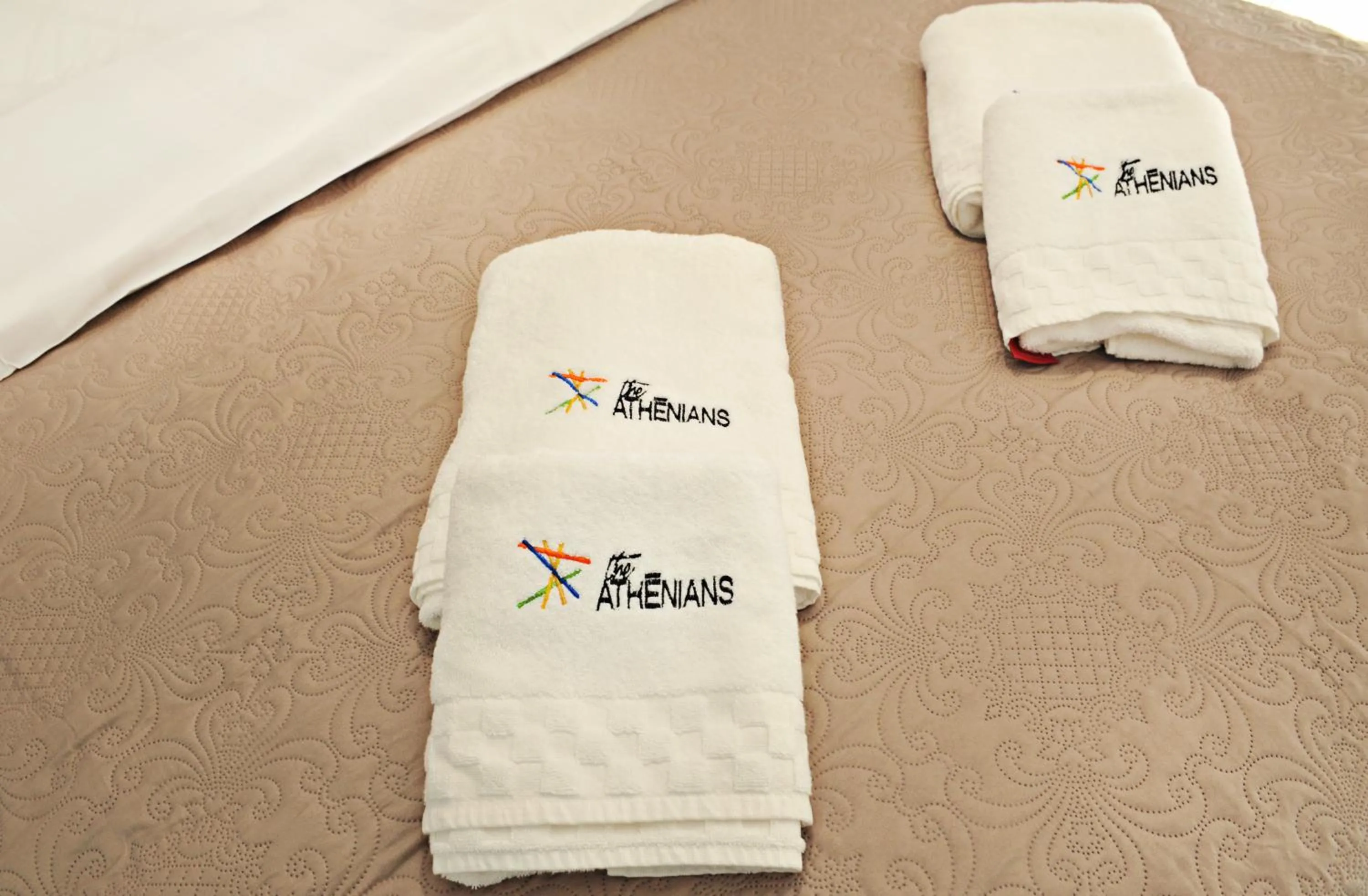 Property logo or sign in The Athenians Modern Apartments