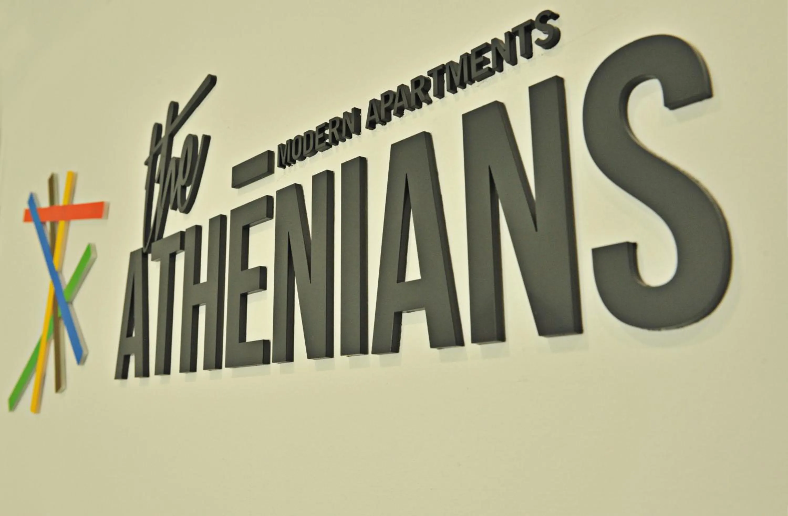 Property logo or sign in The Athenians Modern Apartments