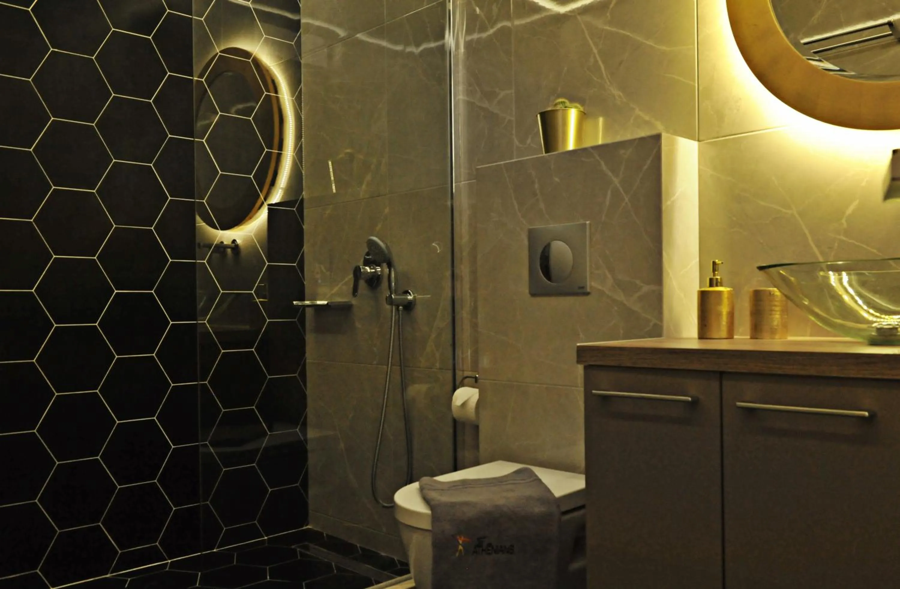 Shower in The Athenians Modern Apartments
