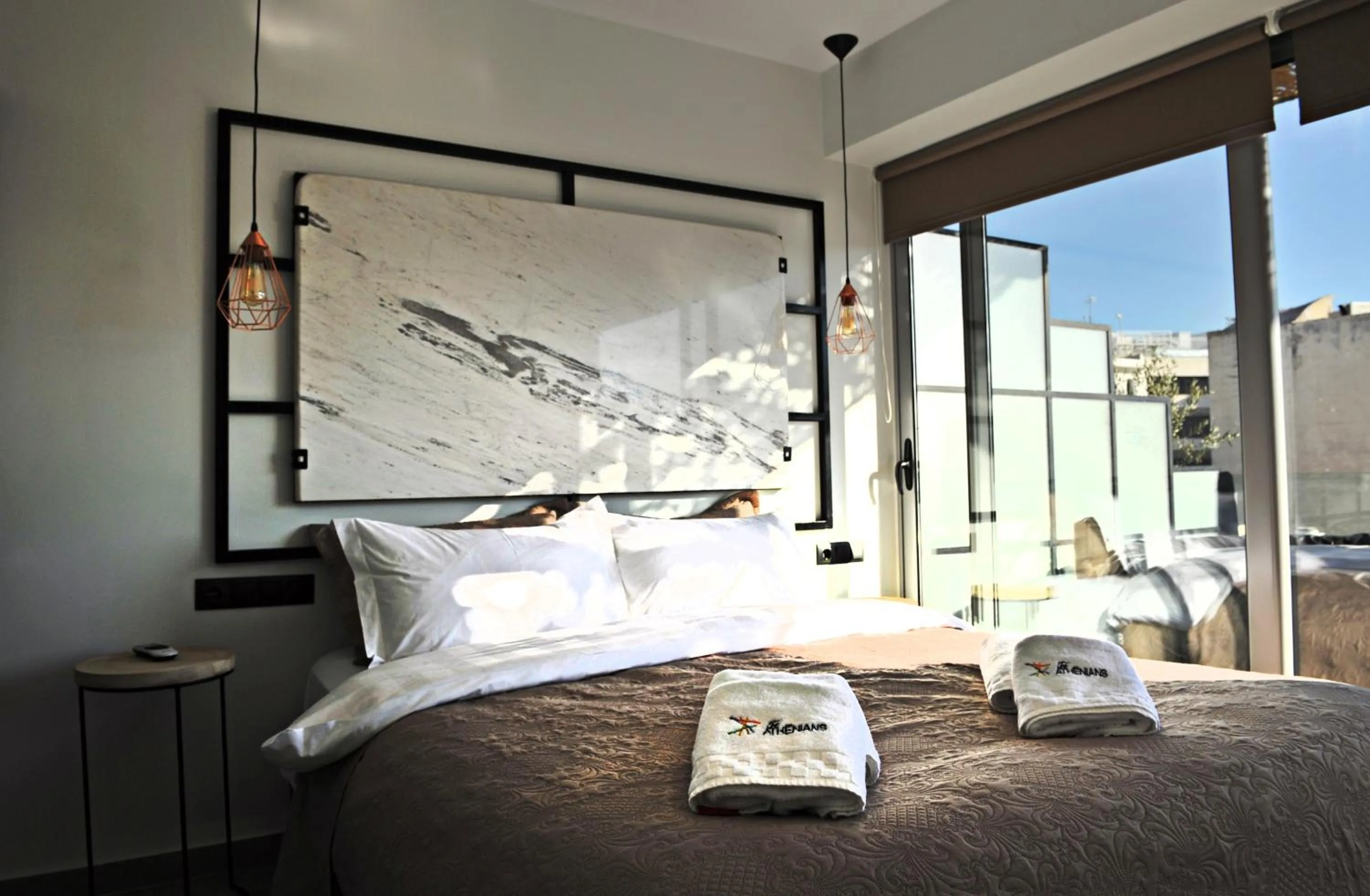 Bed in The Athenians Modern Apartments