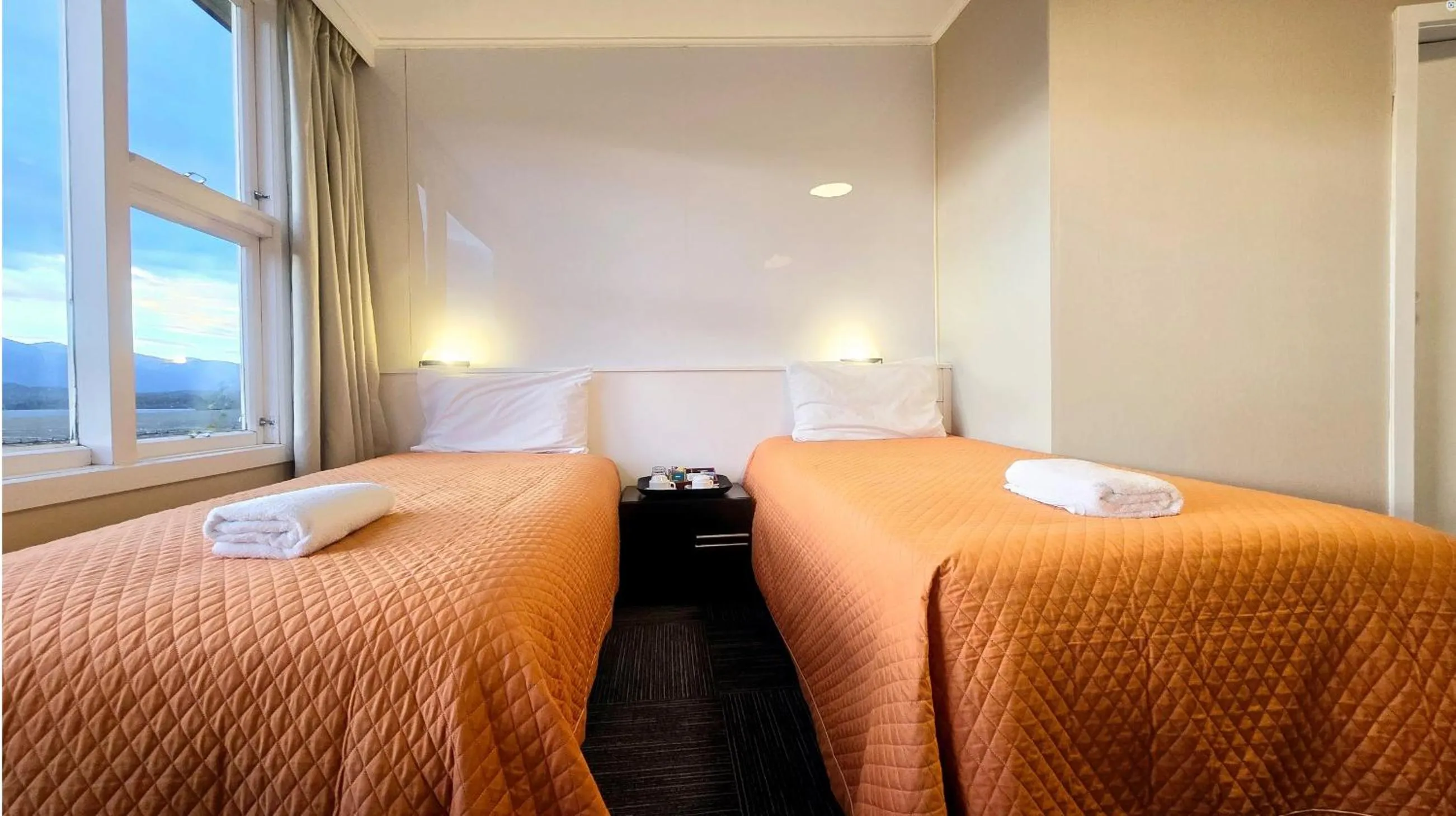 Bed in Te Anau Manapouri Lake Hotel