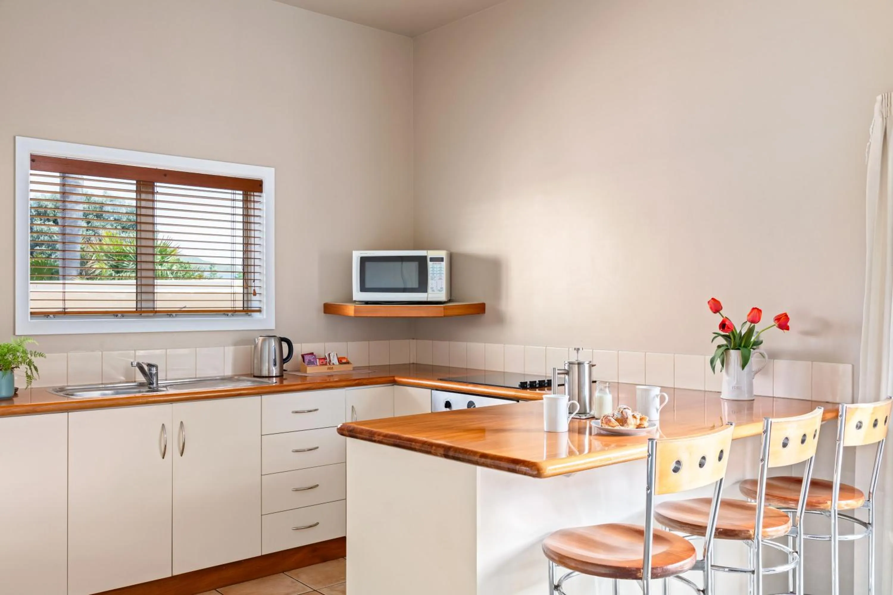 Kitchen or kitchenette in Ocean Beach Wainui