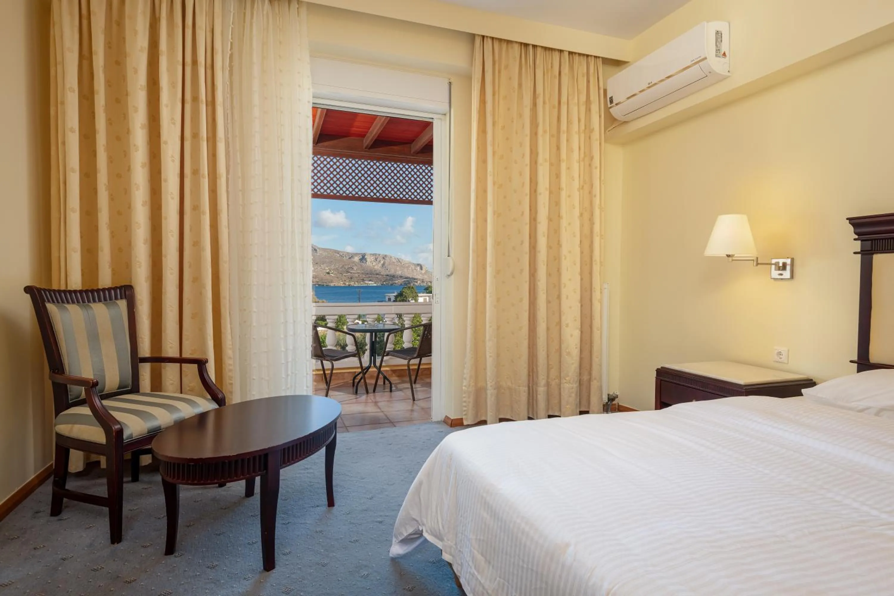 Bed in Crithoni's Paradise Hotel