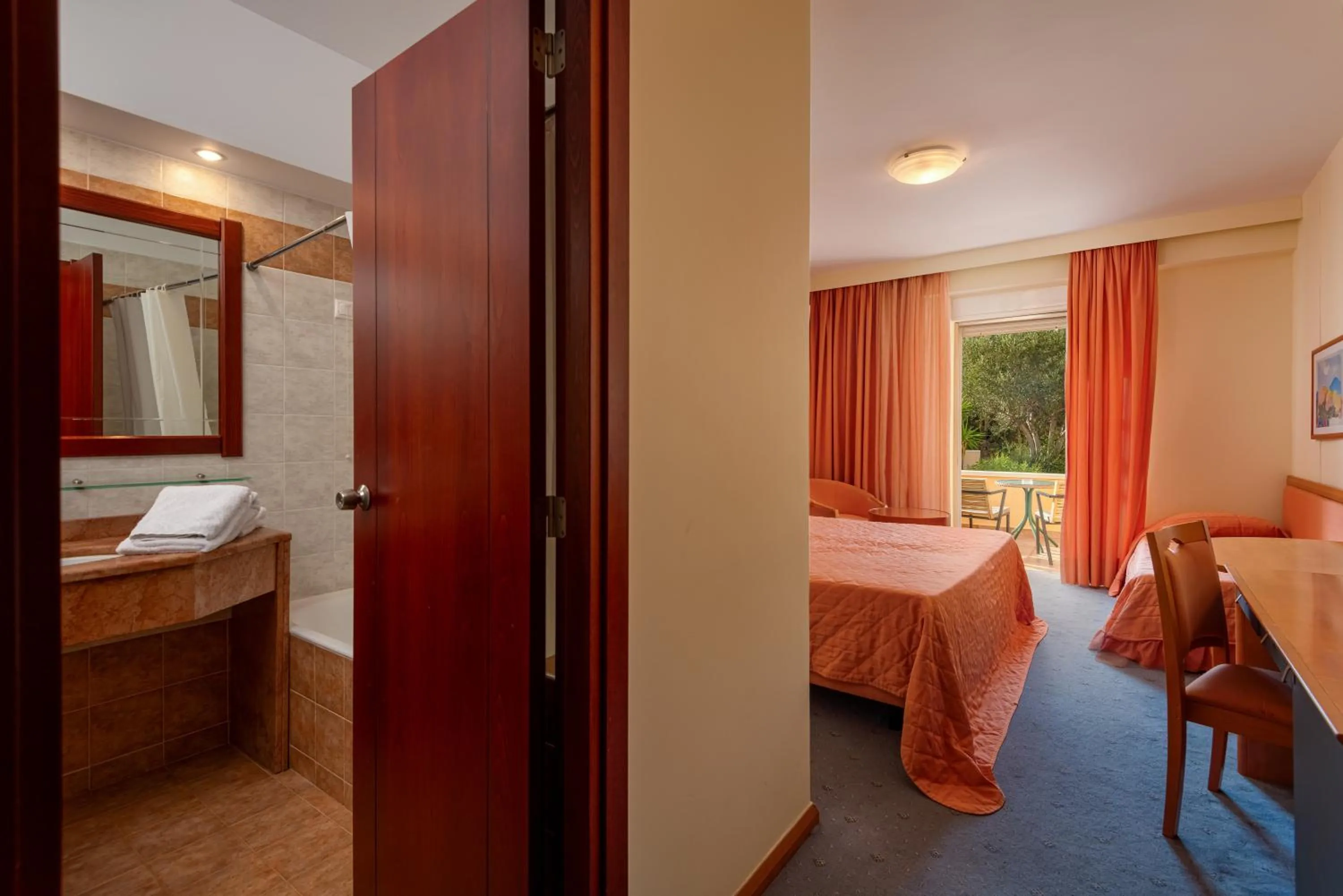 Bed in Crithoni's Paradise Hotel