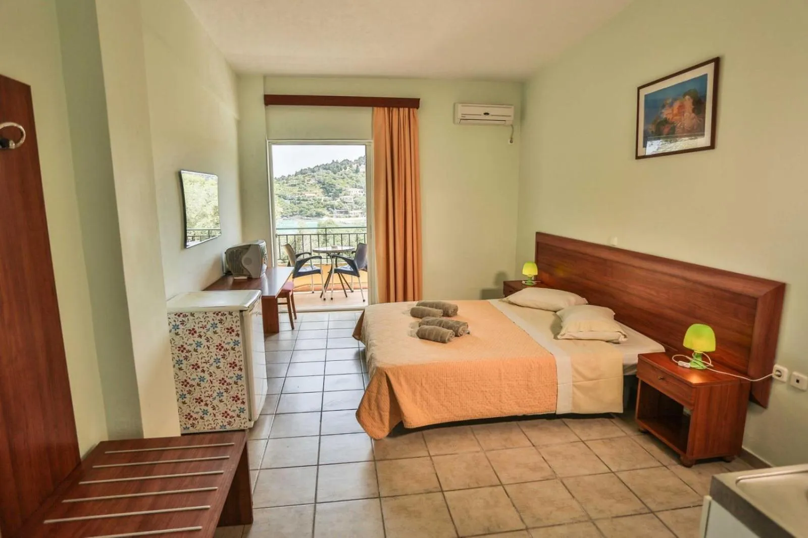 Bed in Amfitriti Hotel & Studios