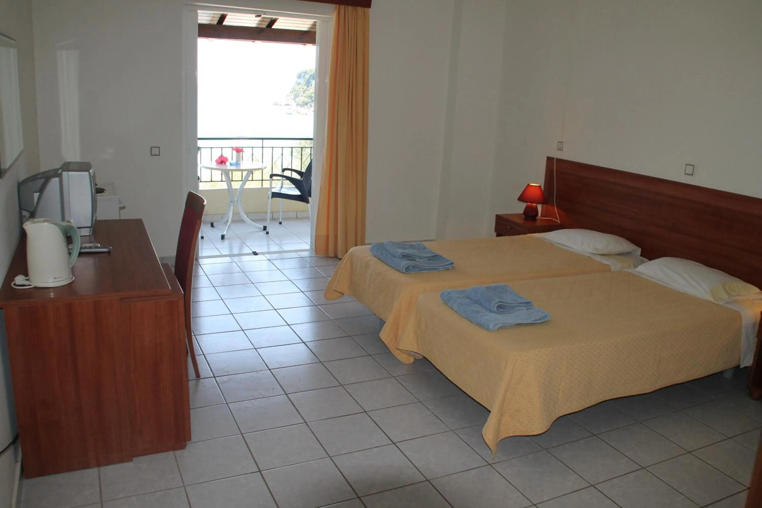 Photo of the whole room, Bed in Amfitriti Hotel & Studios