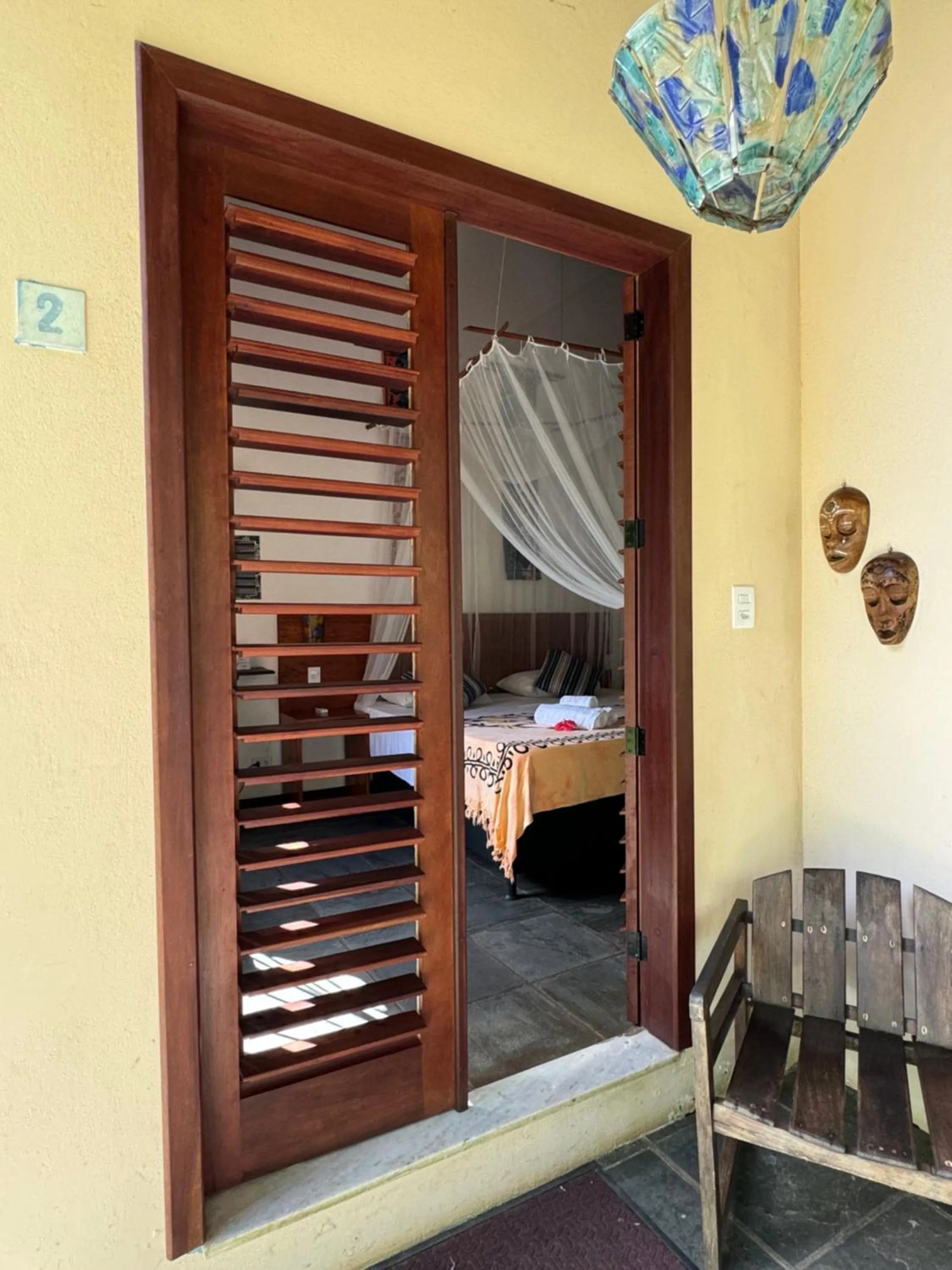 Facade/entrance, Bed in Pousada Horizonte Azul