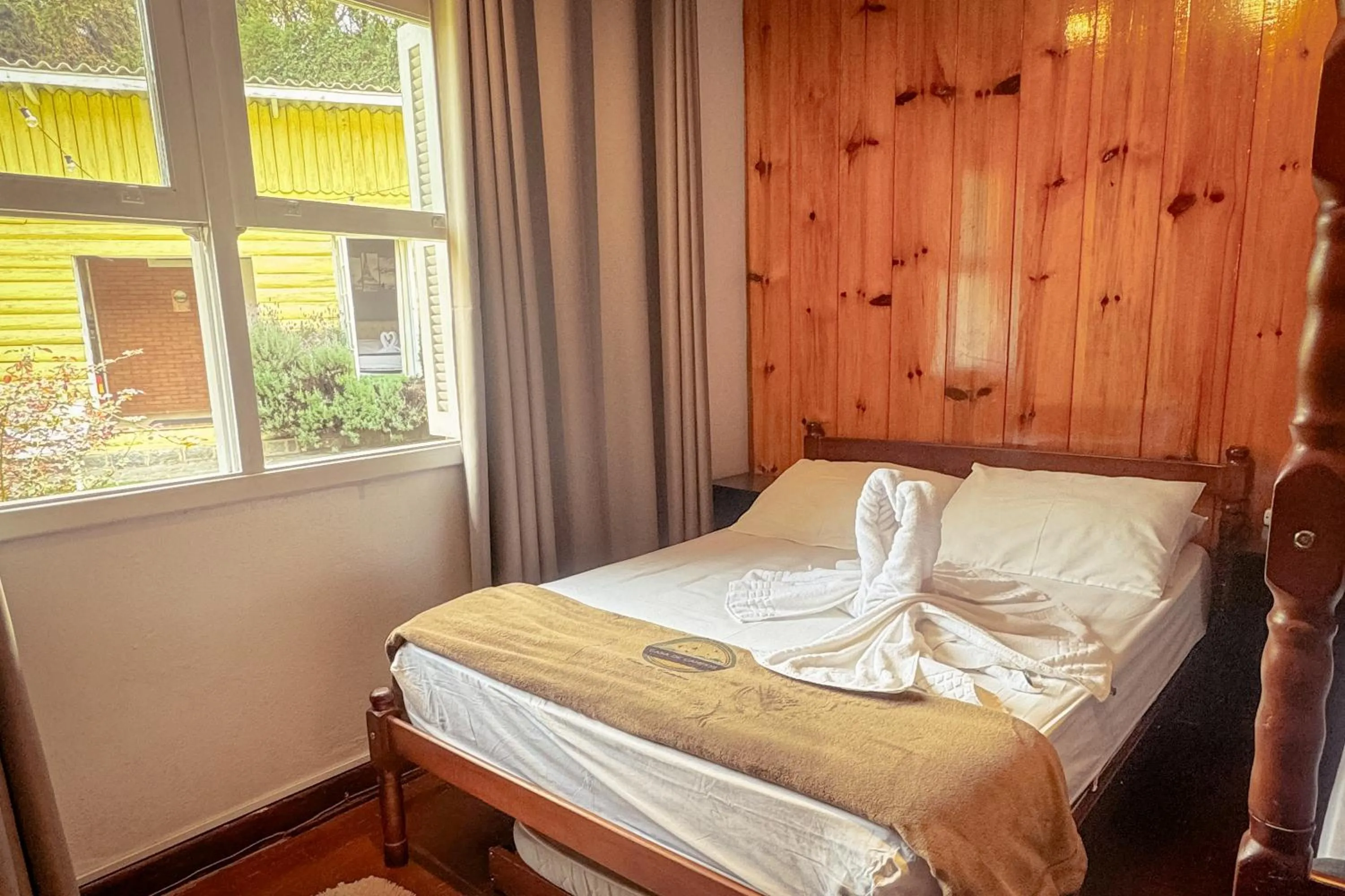 Bed in VELINN Pousada Casa de Campos Capivari House