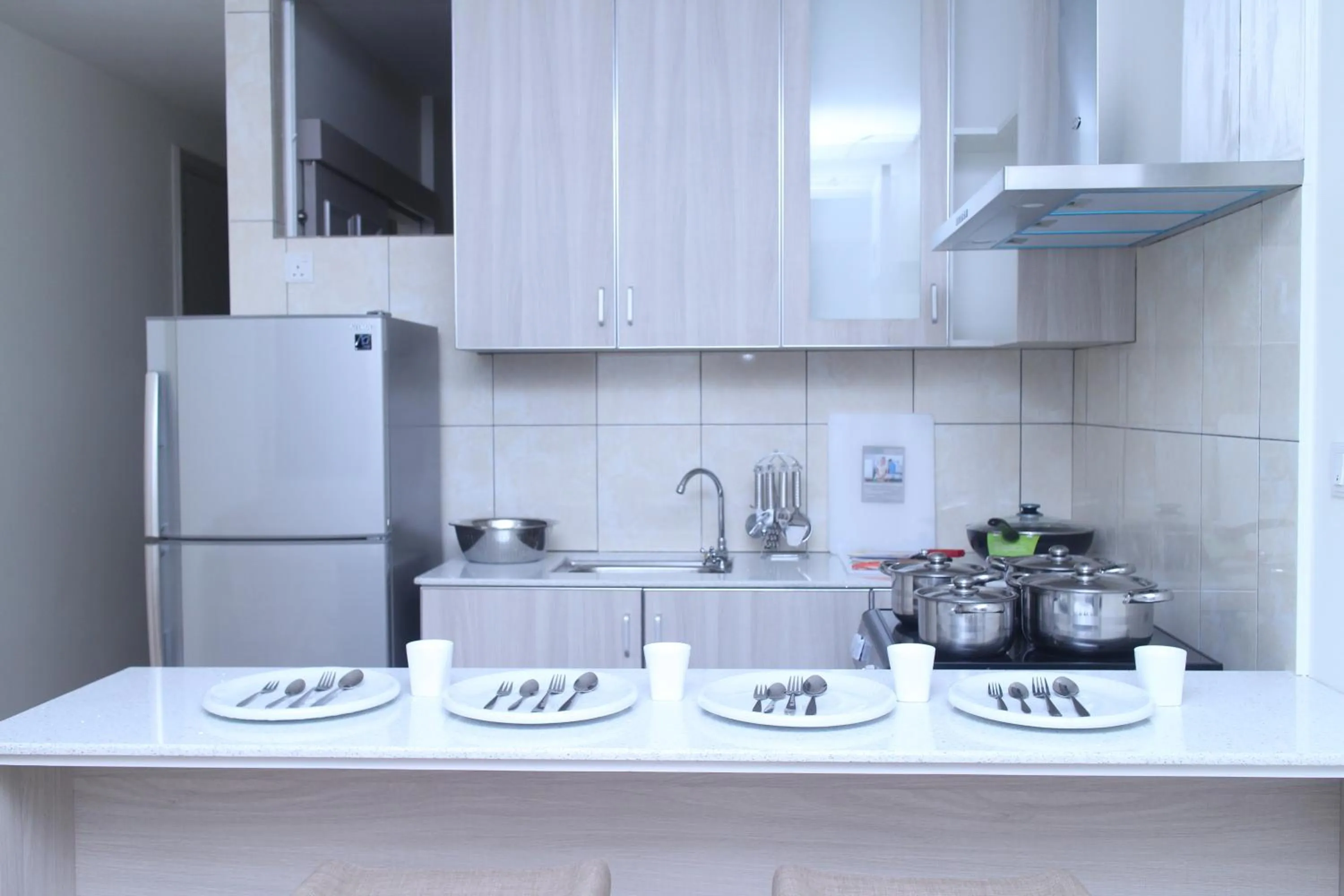 Kitchen or kitchenette in Wafa Hotel & Apartment