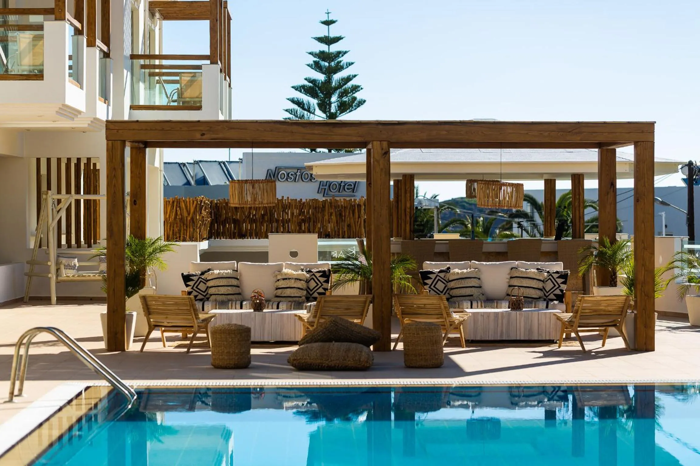 Swimming pool in Nostos Beach Boutique Hotel