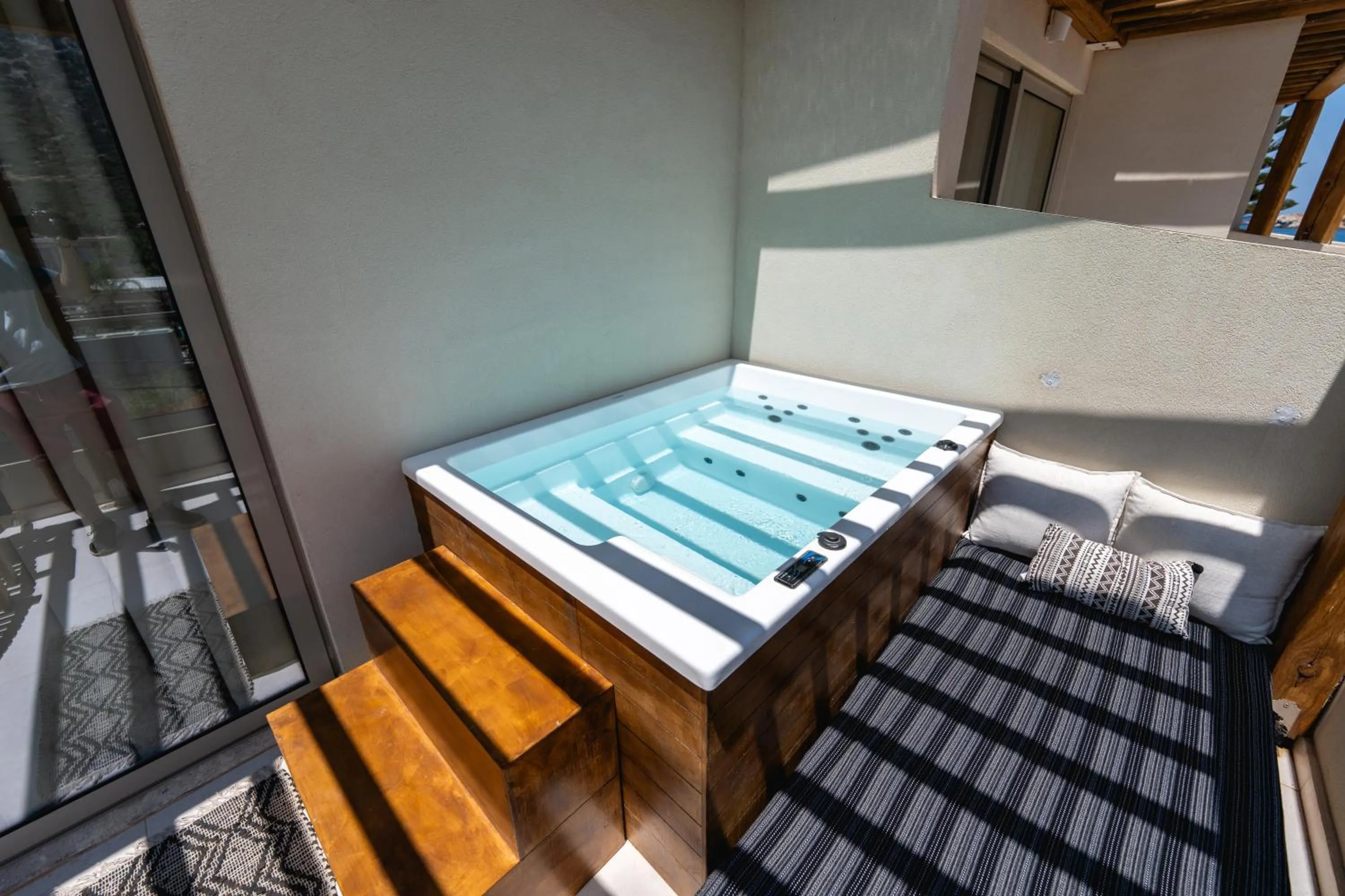 Balcony/Terrace, Bed in Nostos Beach Boutique Hotel