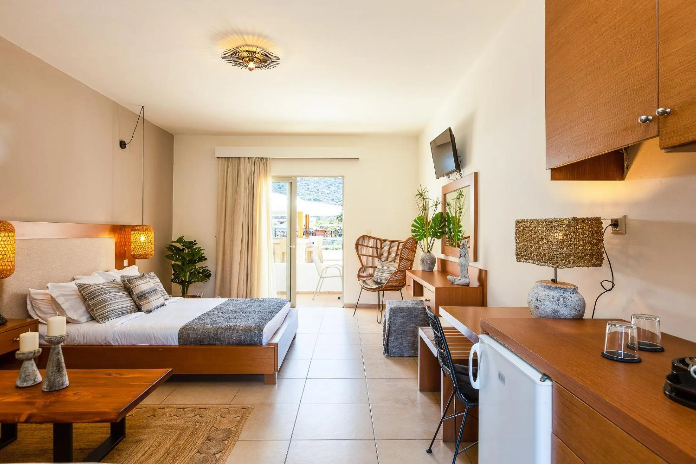 Photo of the whole room, Bed in Nostos Beach Boutique Hotel