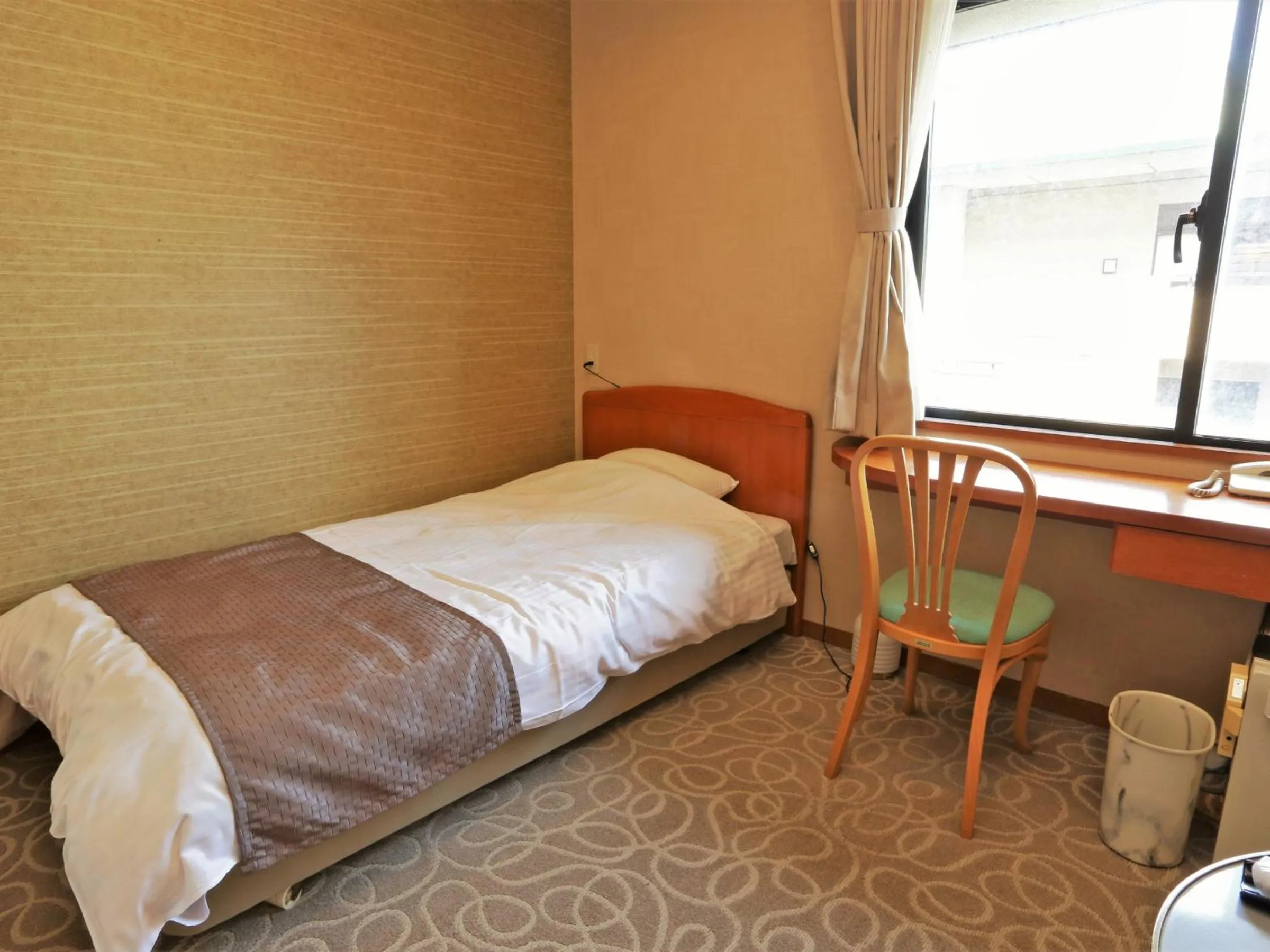 Bed in Awara Onsen Matuya Sen Sen