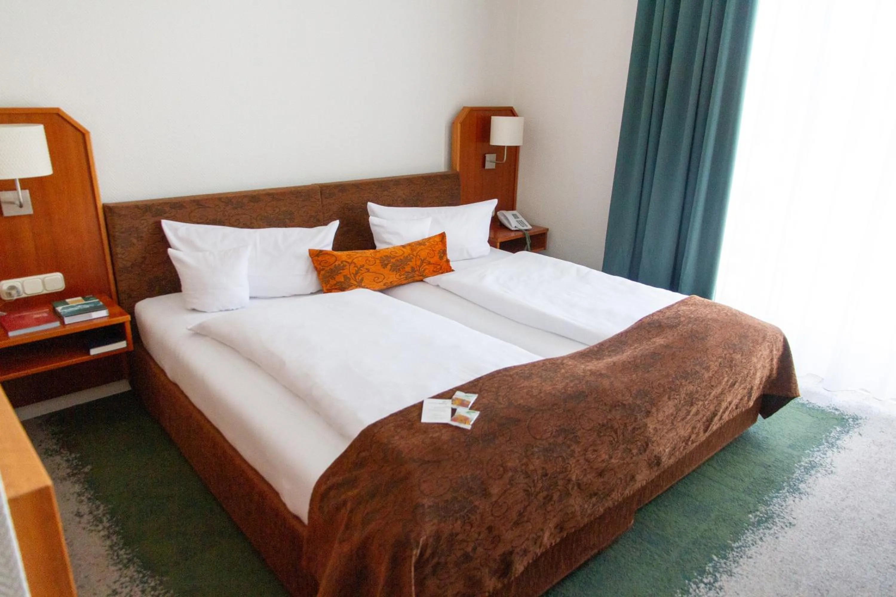 Photo of the whole room, Bed in Landhotel Rügheim