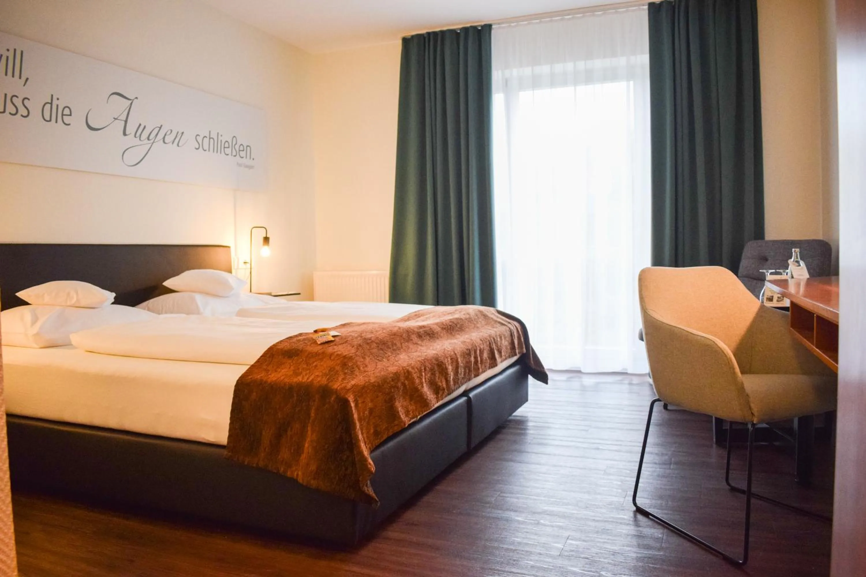 Photo of the whole room, Bed in Landhotel Rügheim