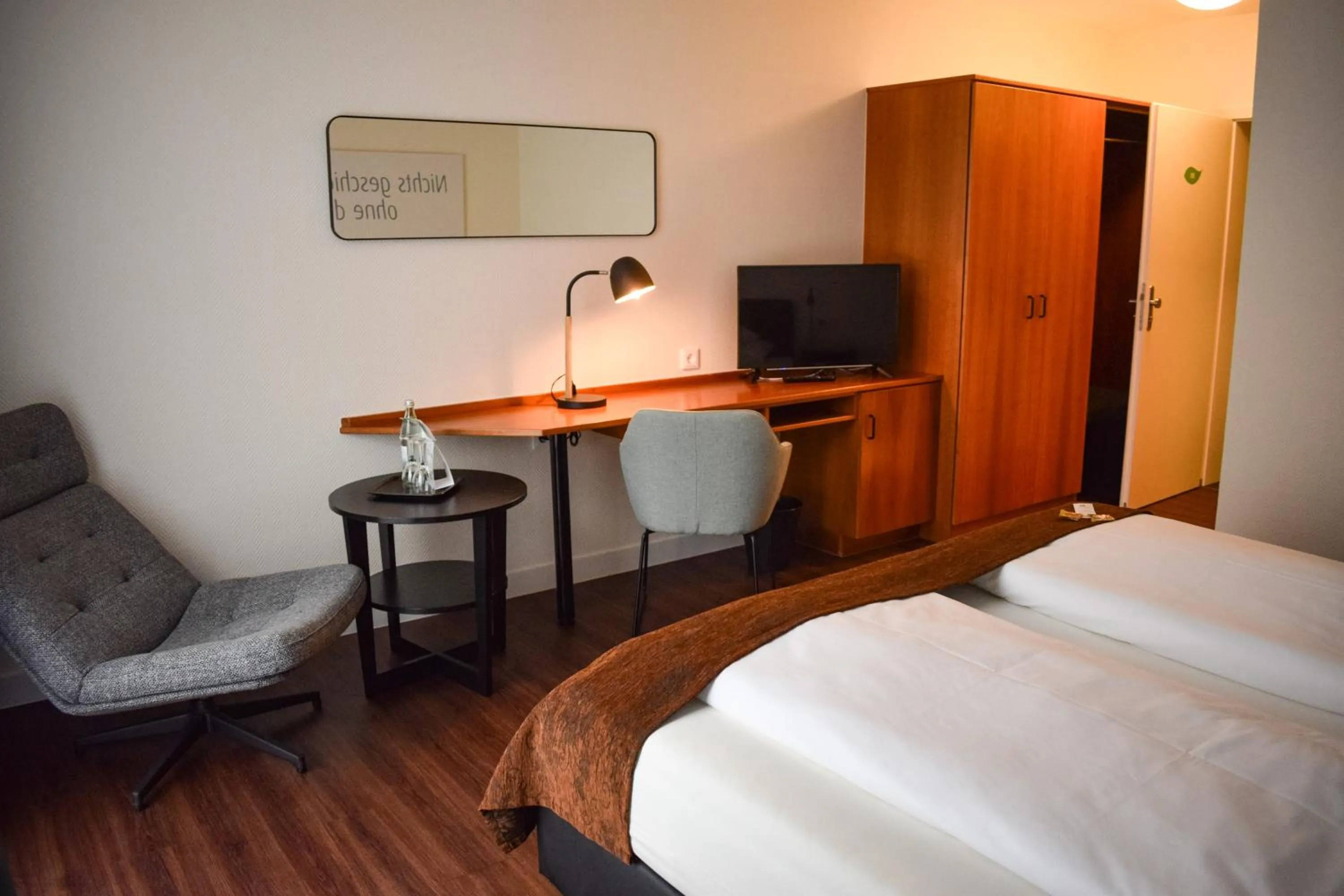 Photo of the whole room, Bed in Landhotel Rügheim