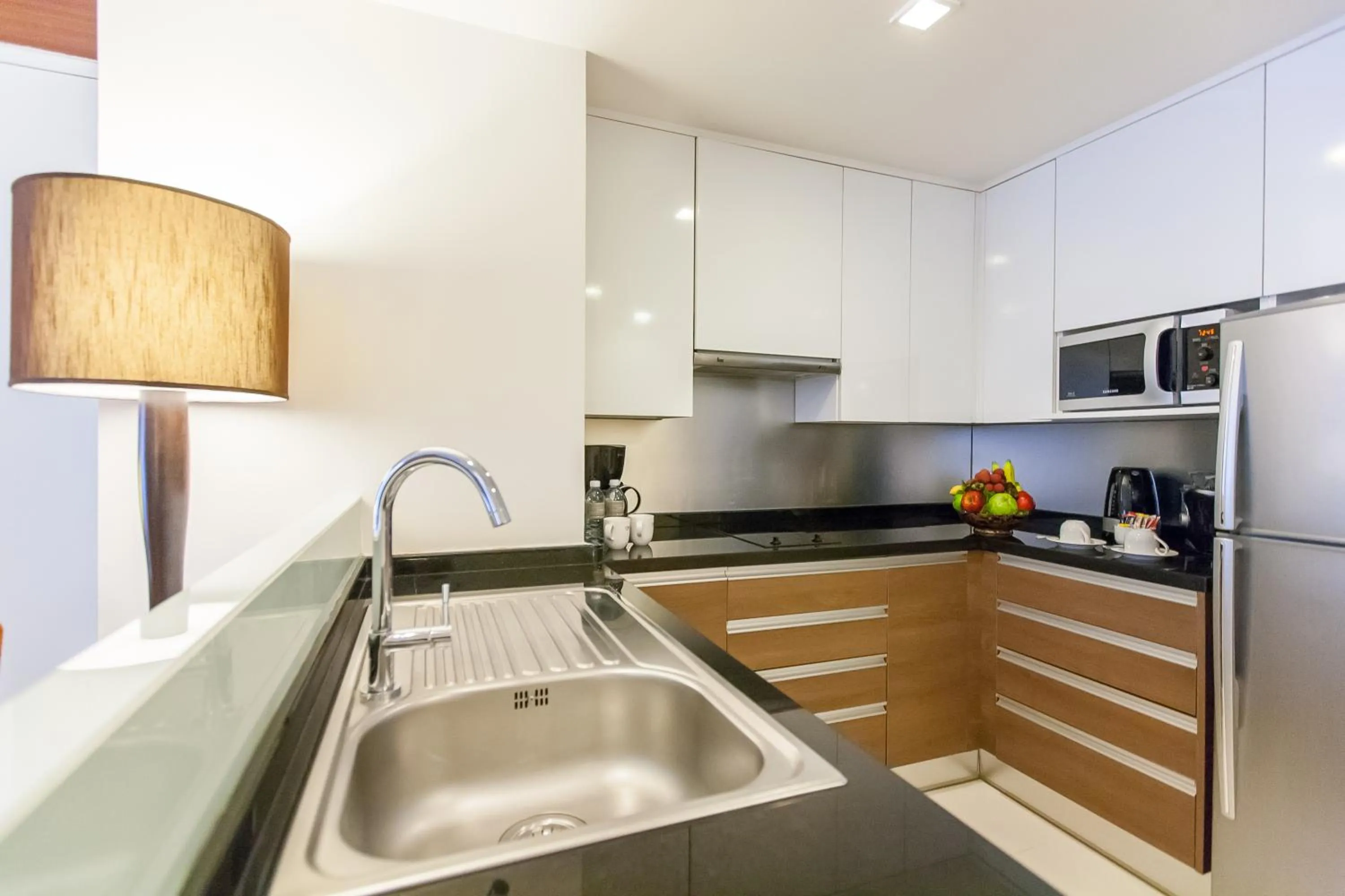 Kitchen or kitchenette in Oakwood Residence Sukhumvit 24 Bangkok