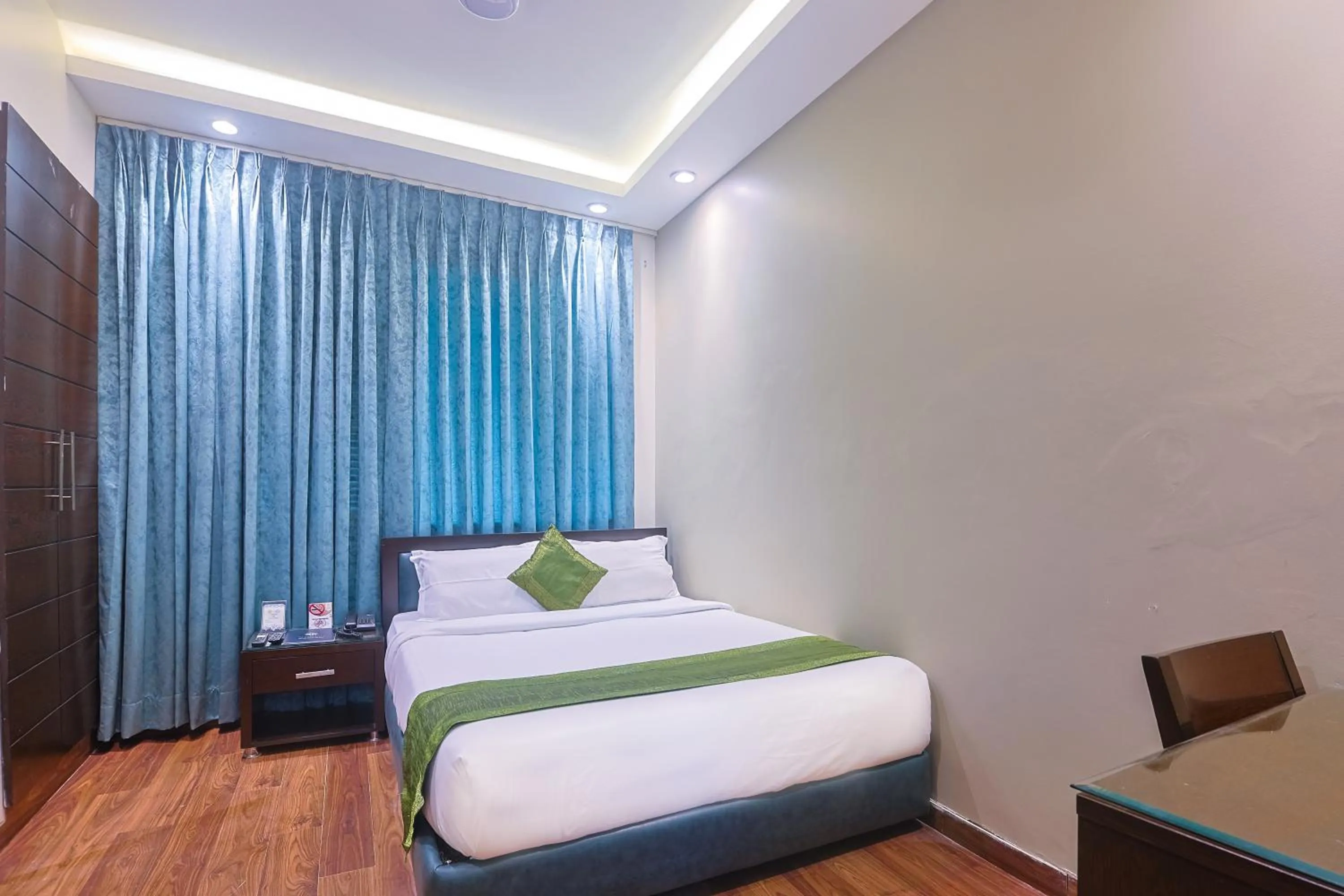 Bed in Amber Inn by Orion Hotels