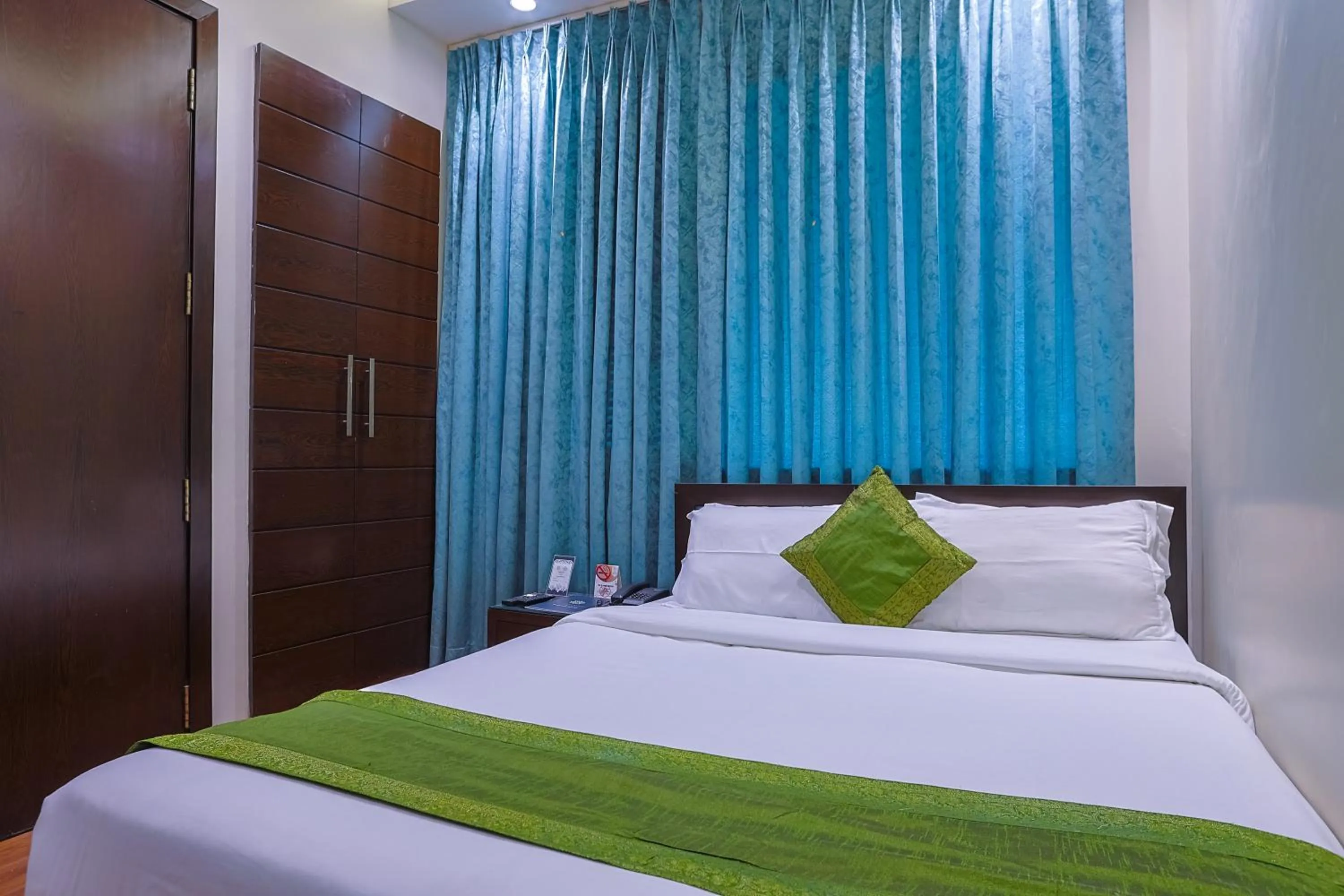 Bed in Amber Inn by Orion Hotels