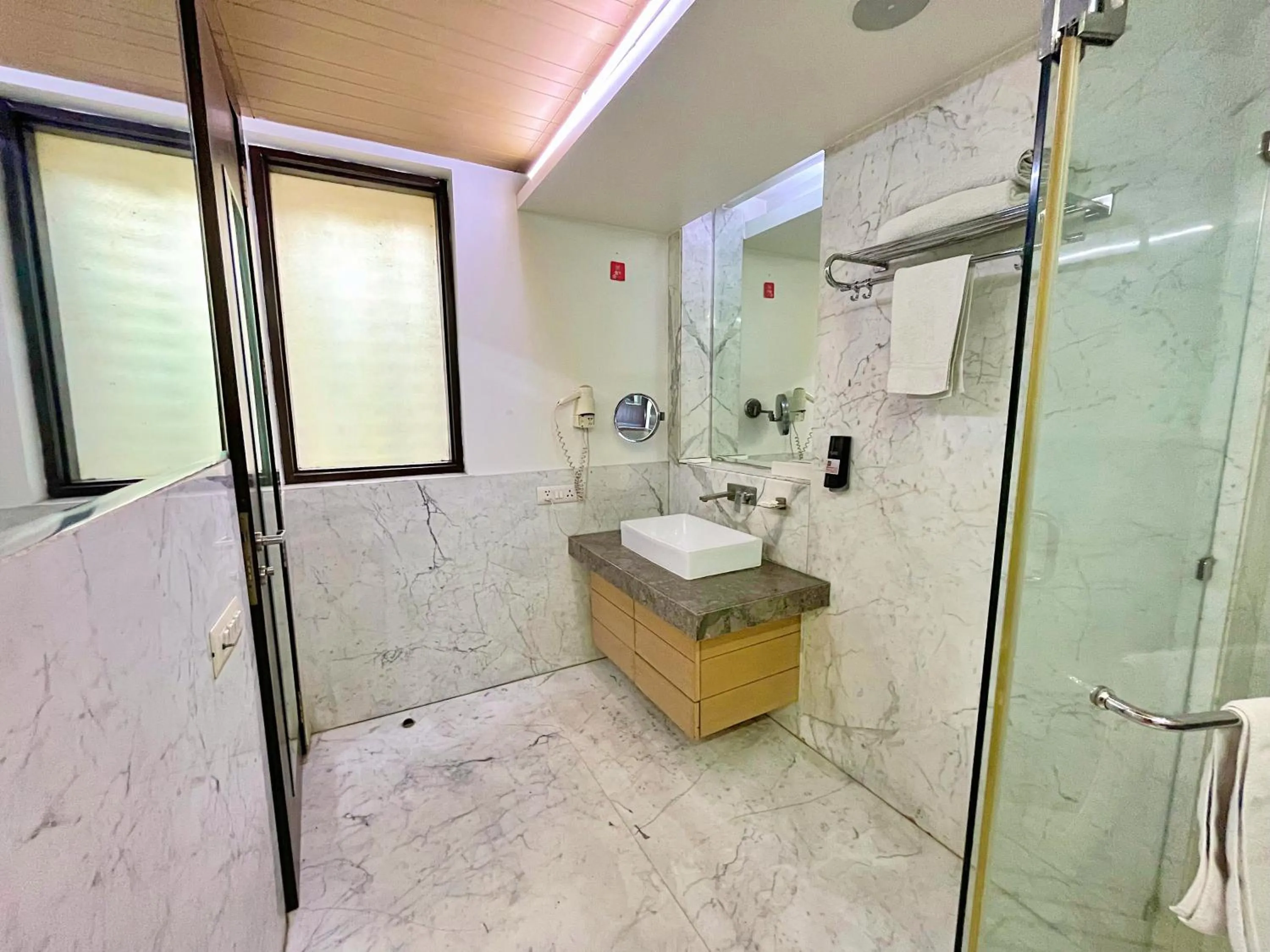 Bathroom in Amber Inn by Orion Hotels