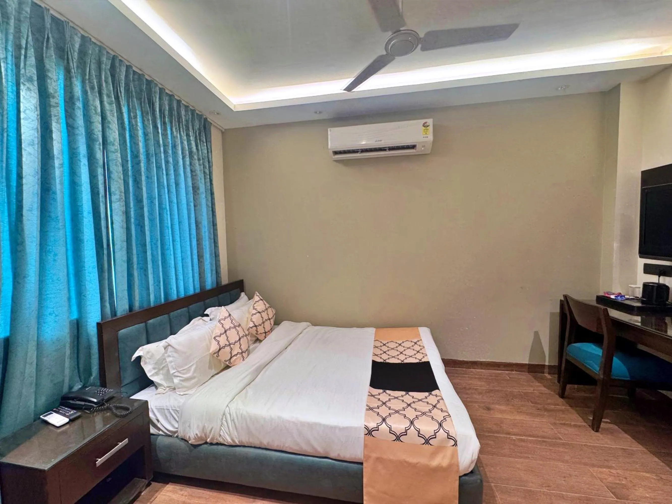 Bed in Amber Inn by Orion Hotels