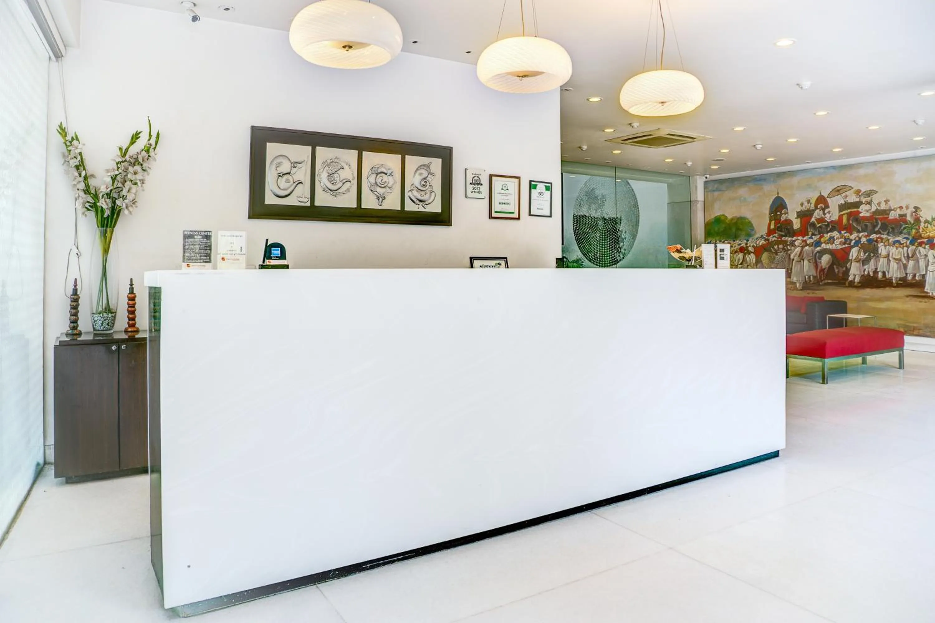 Lobby or reception in Amber Inn by Orion Hotels