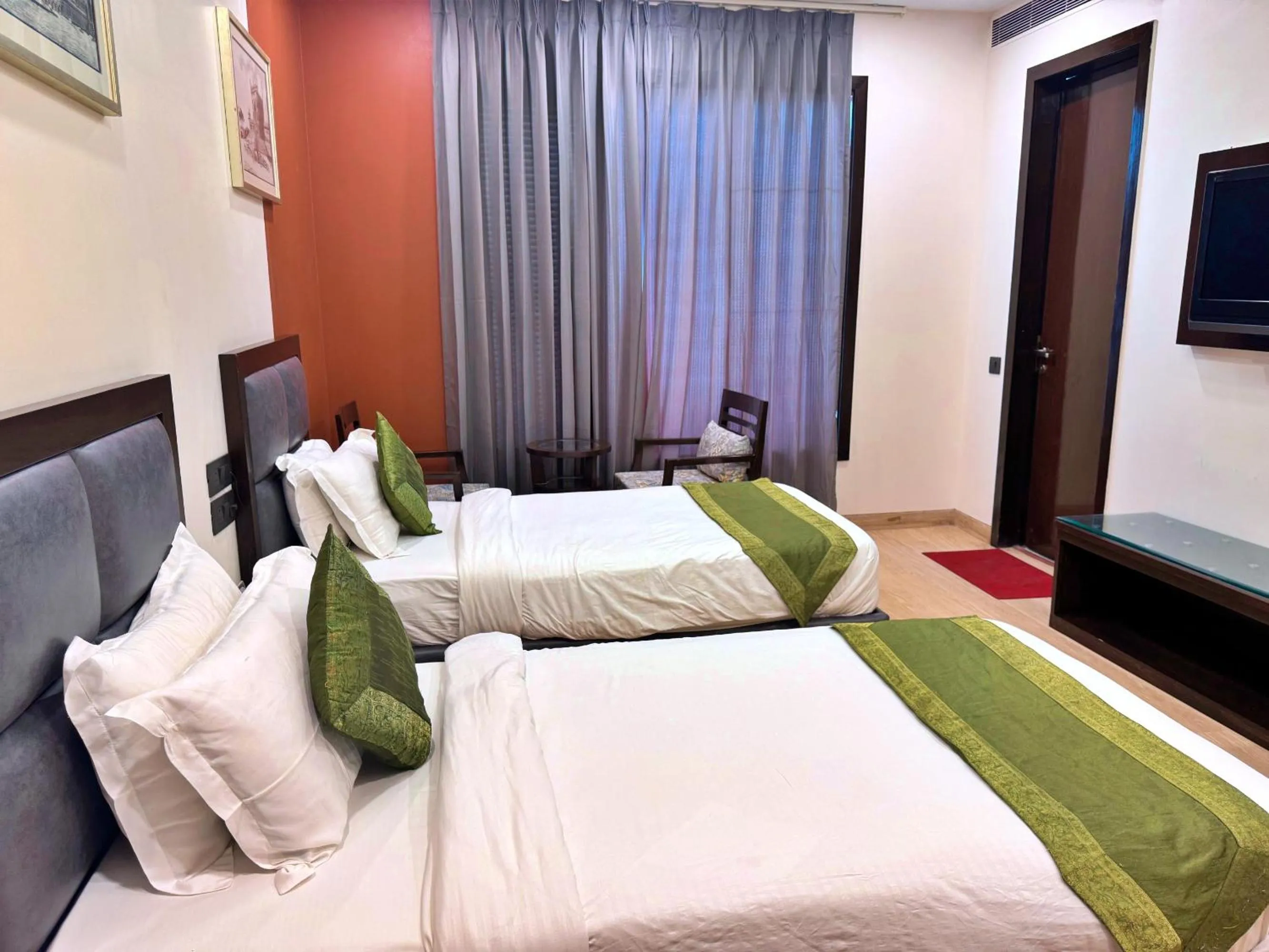 Bed in Amber Inn by Orion Hotels
