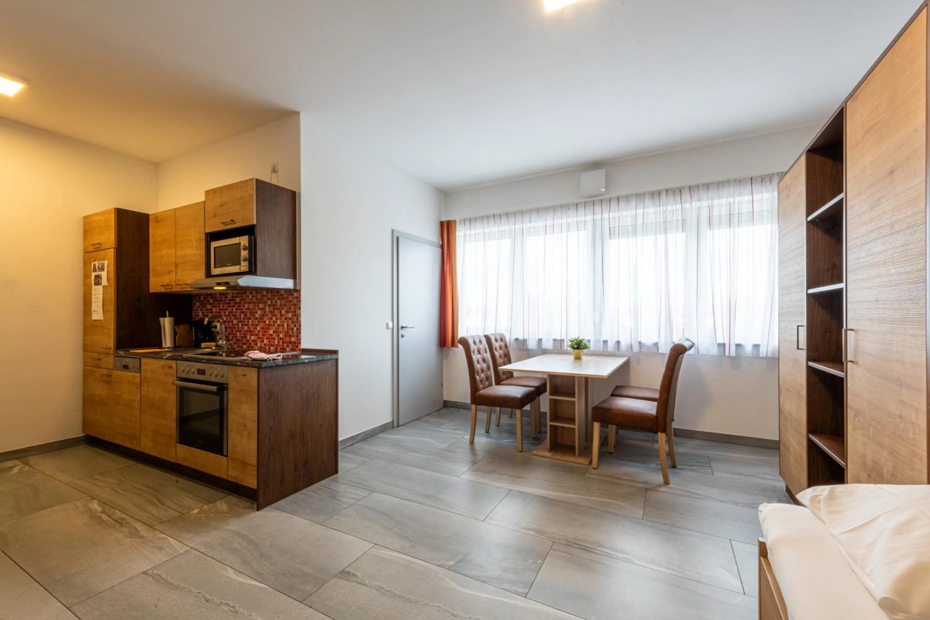 Kitchen or kitchenette in Wels Inn Hotel