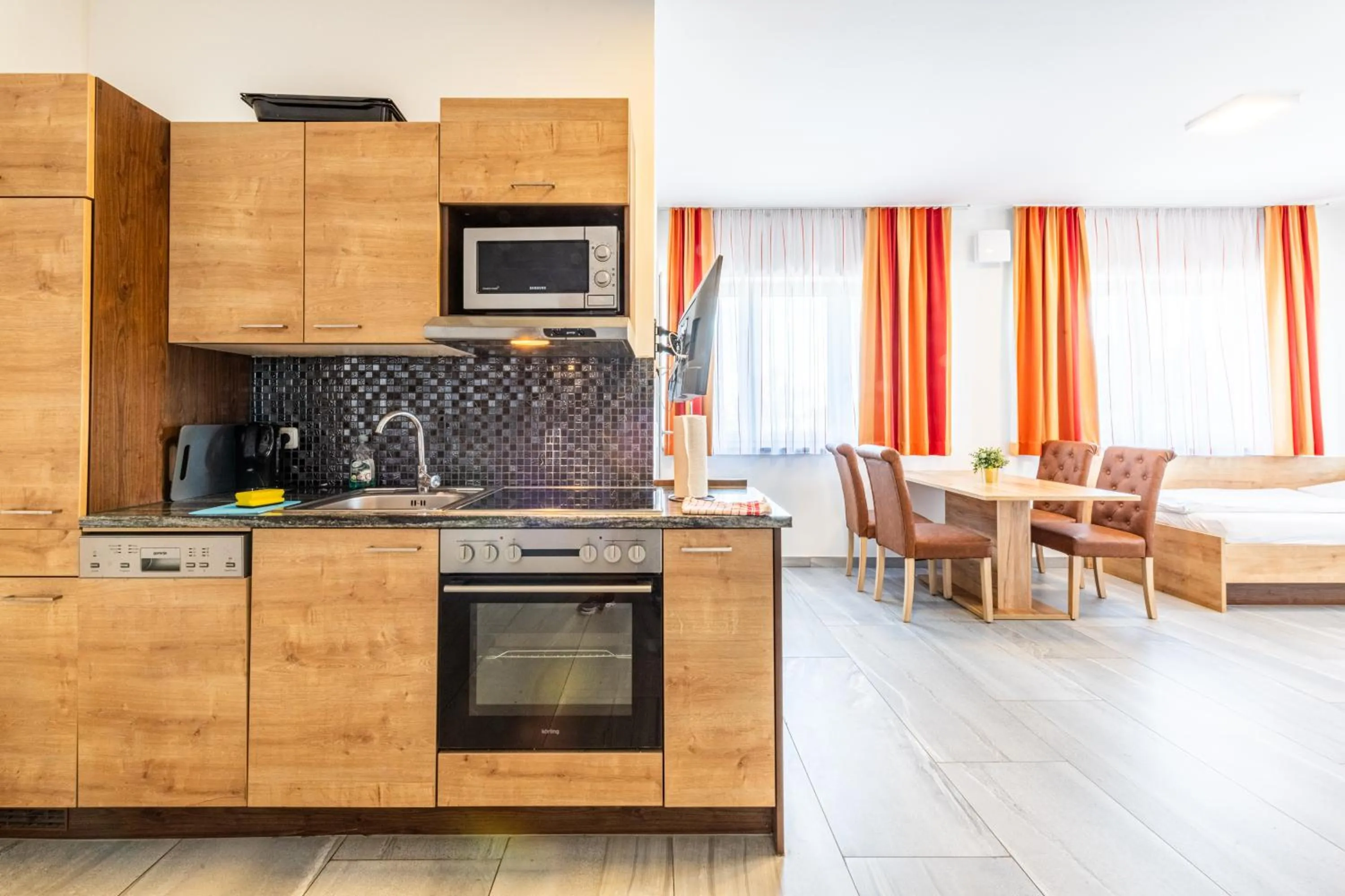 Kitchen or kitchenette in Wels Inn Hotel