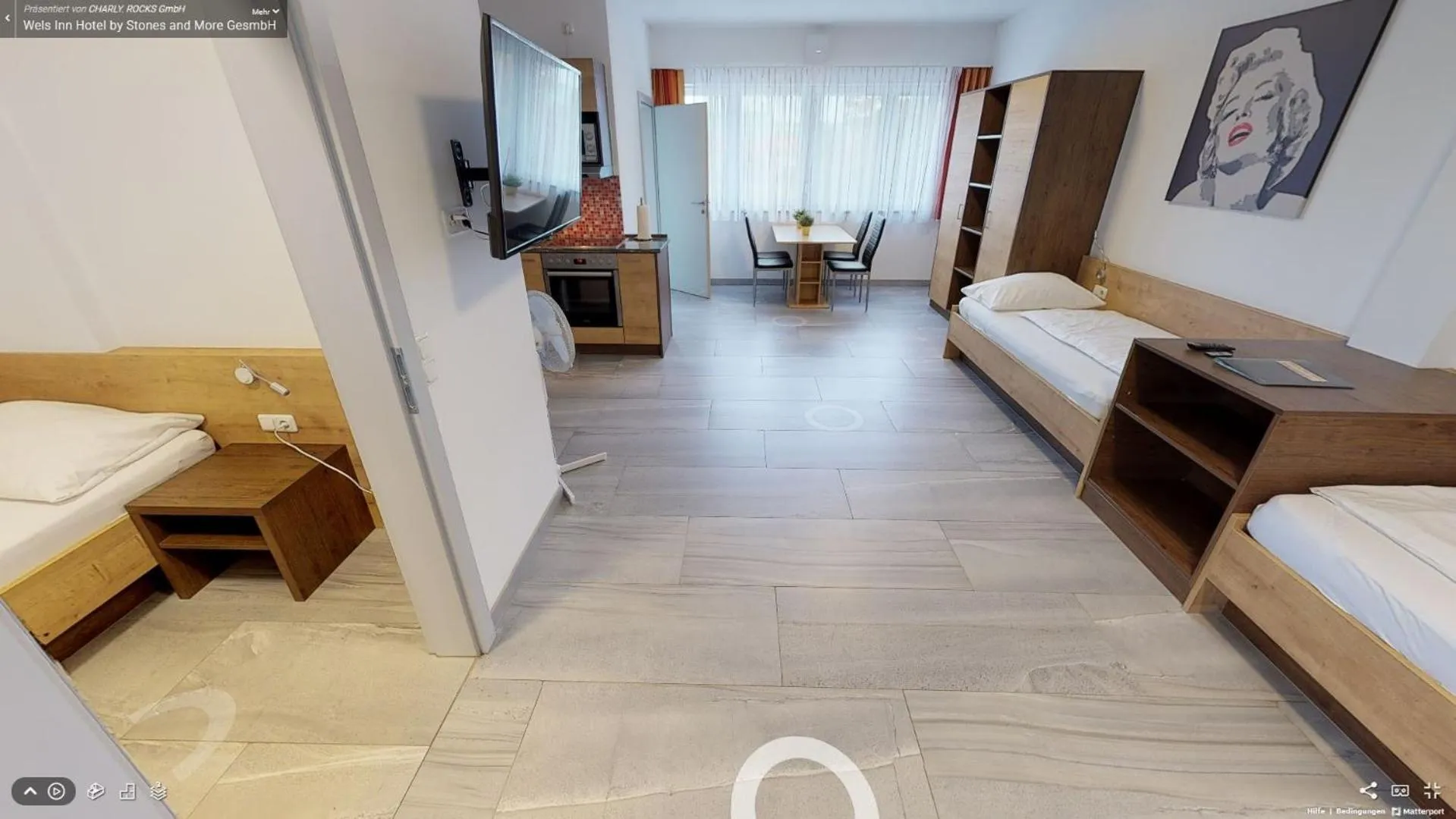 Seating area, Bed in Wels Inn Hotel