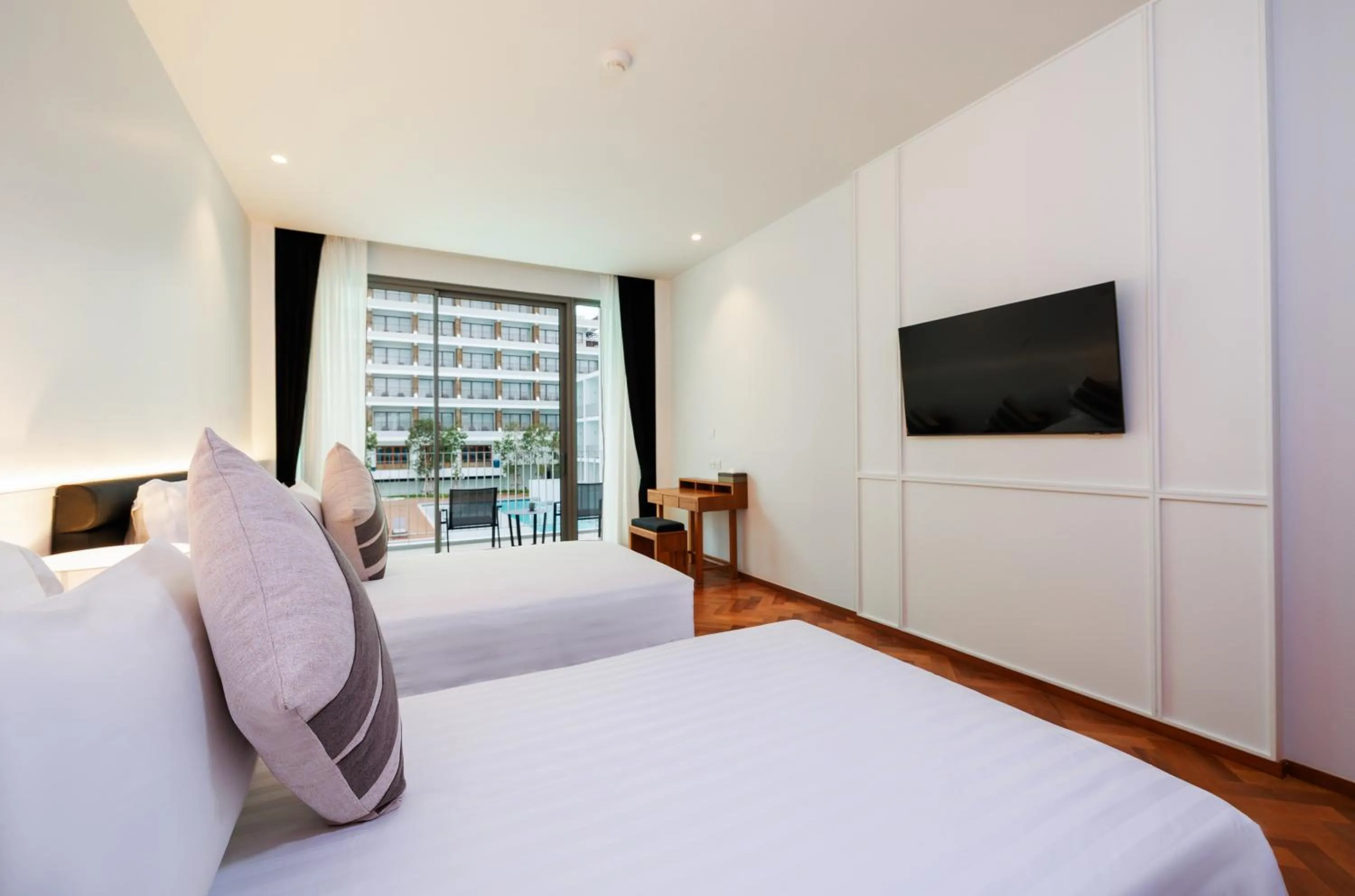 Bed in Patong Beach Hotel by See2Sea