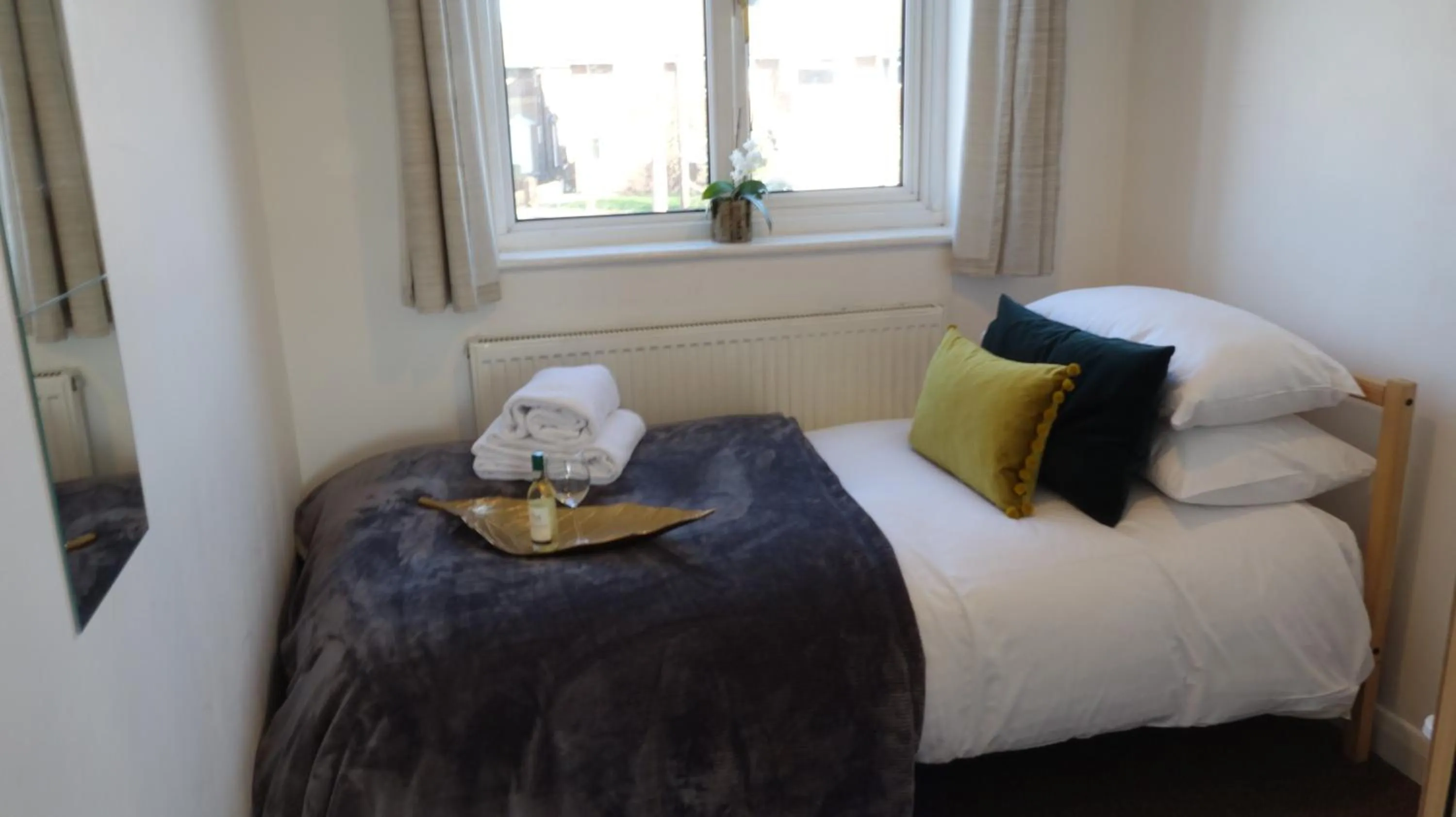 Bedroom in Airport Garden Rooms