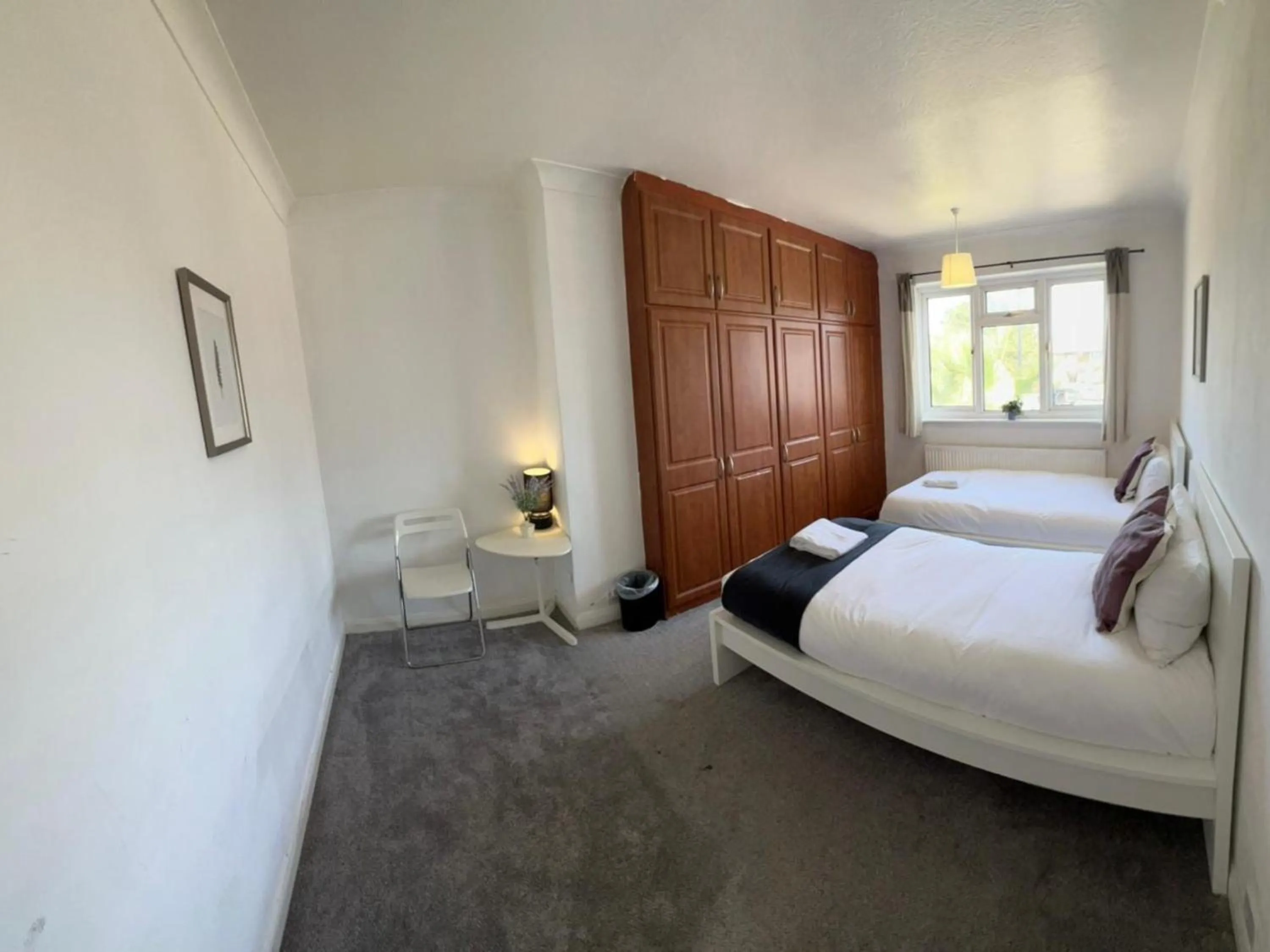 Bed in Airport Garden Rooms