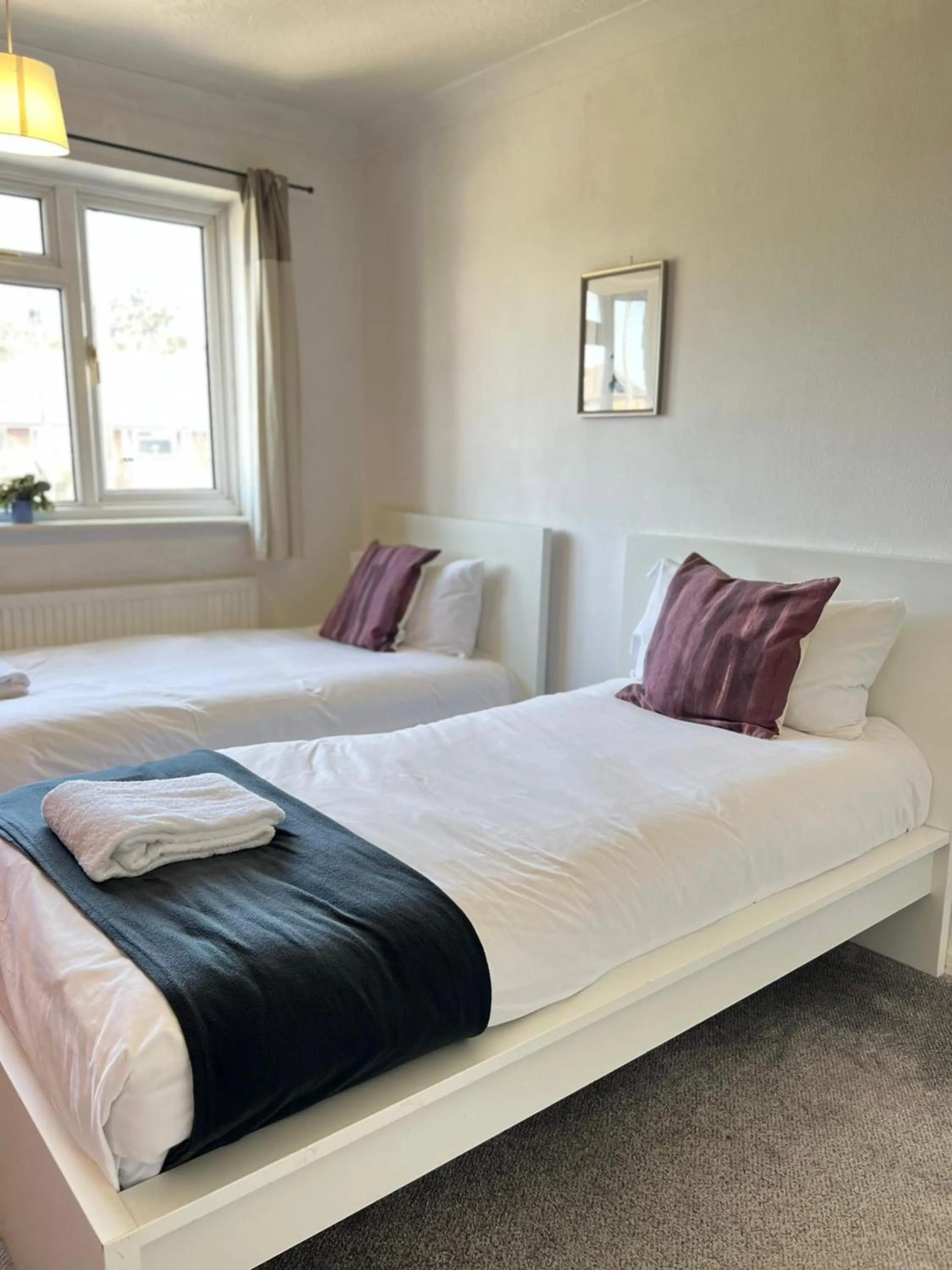 Bed in Airport Garden Rooms