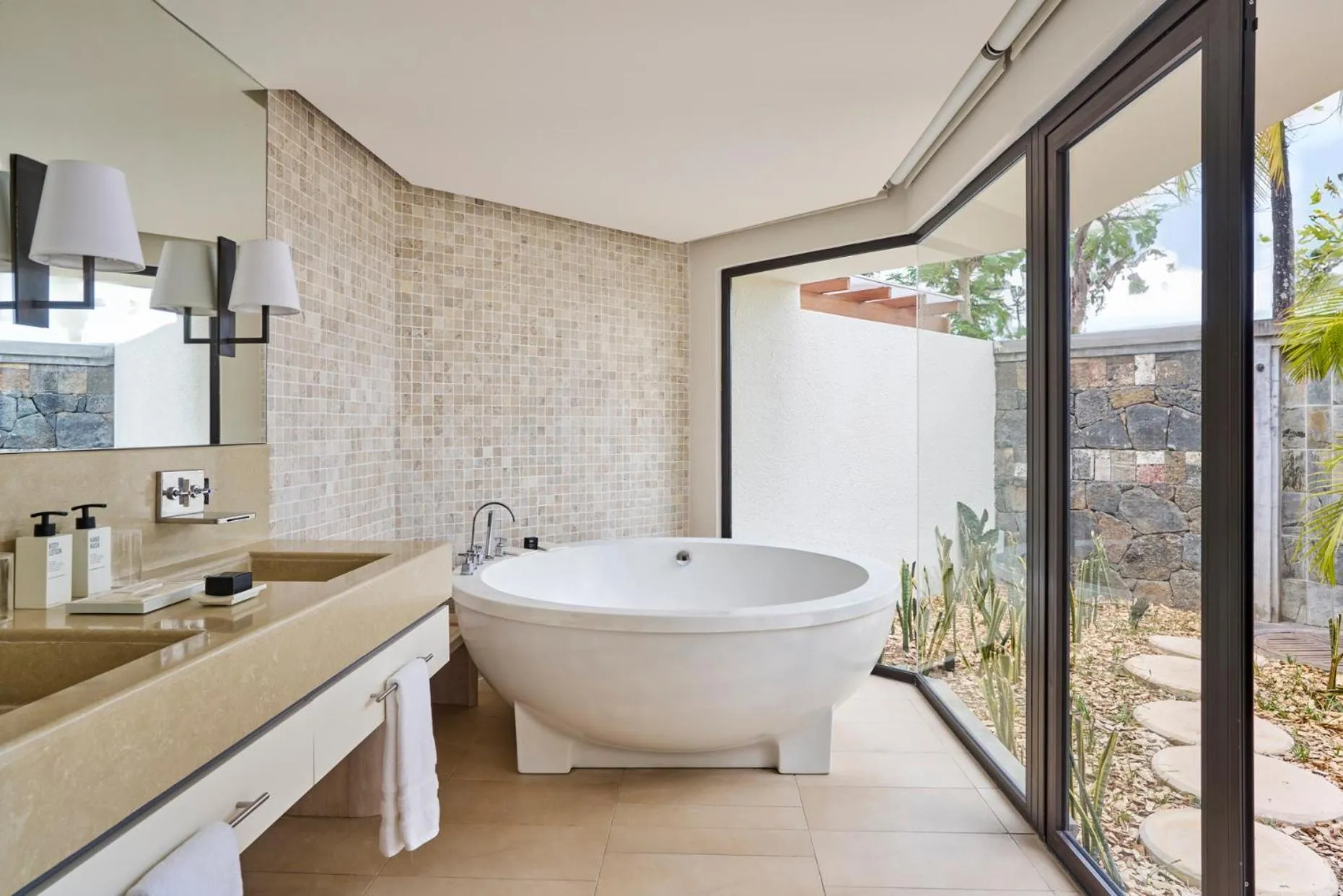 Bathroom in LUX* Belle Mare Resort & Villas