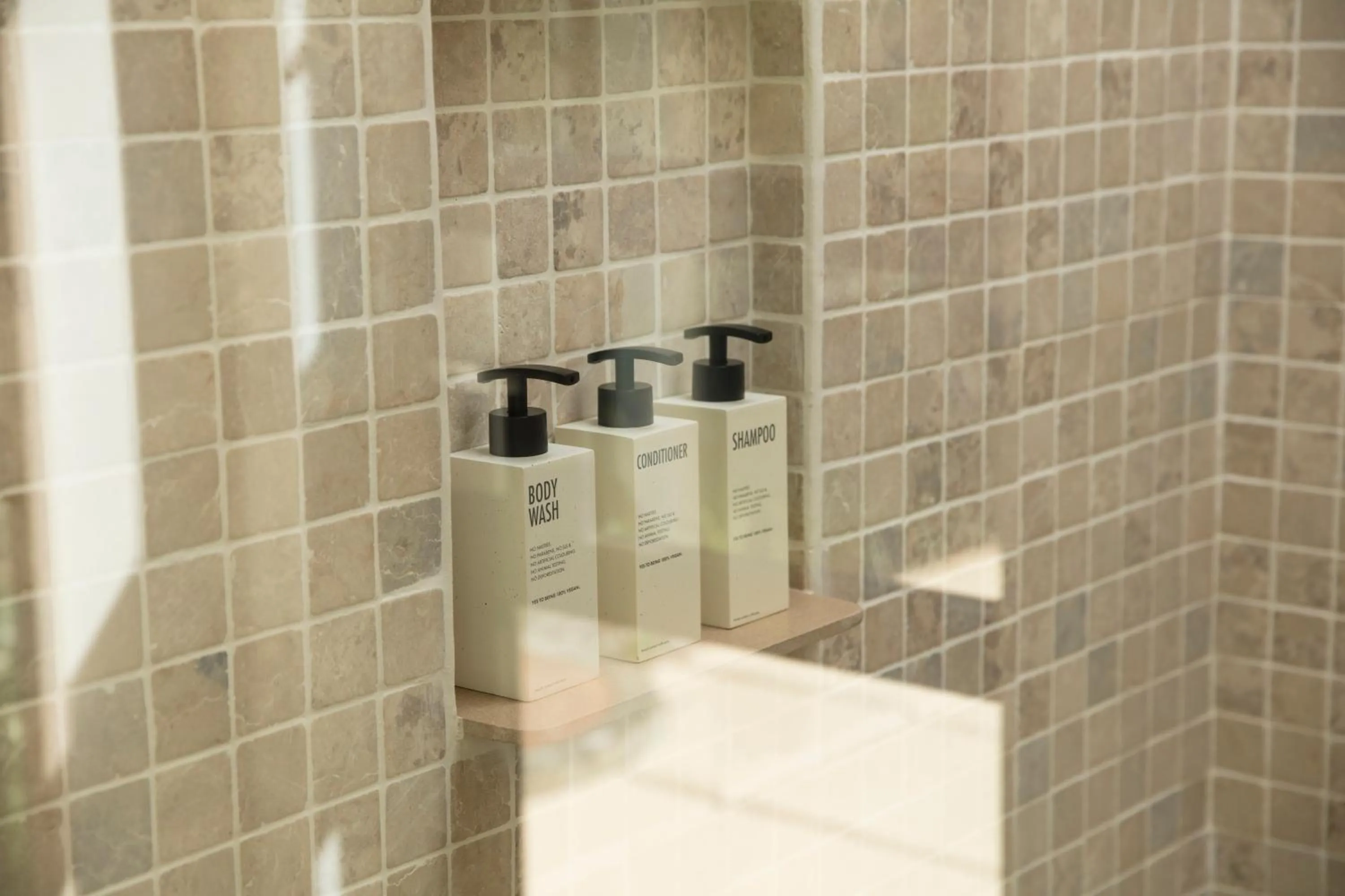 Bathroom in LUX* Belle Mare Resort & Villas