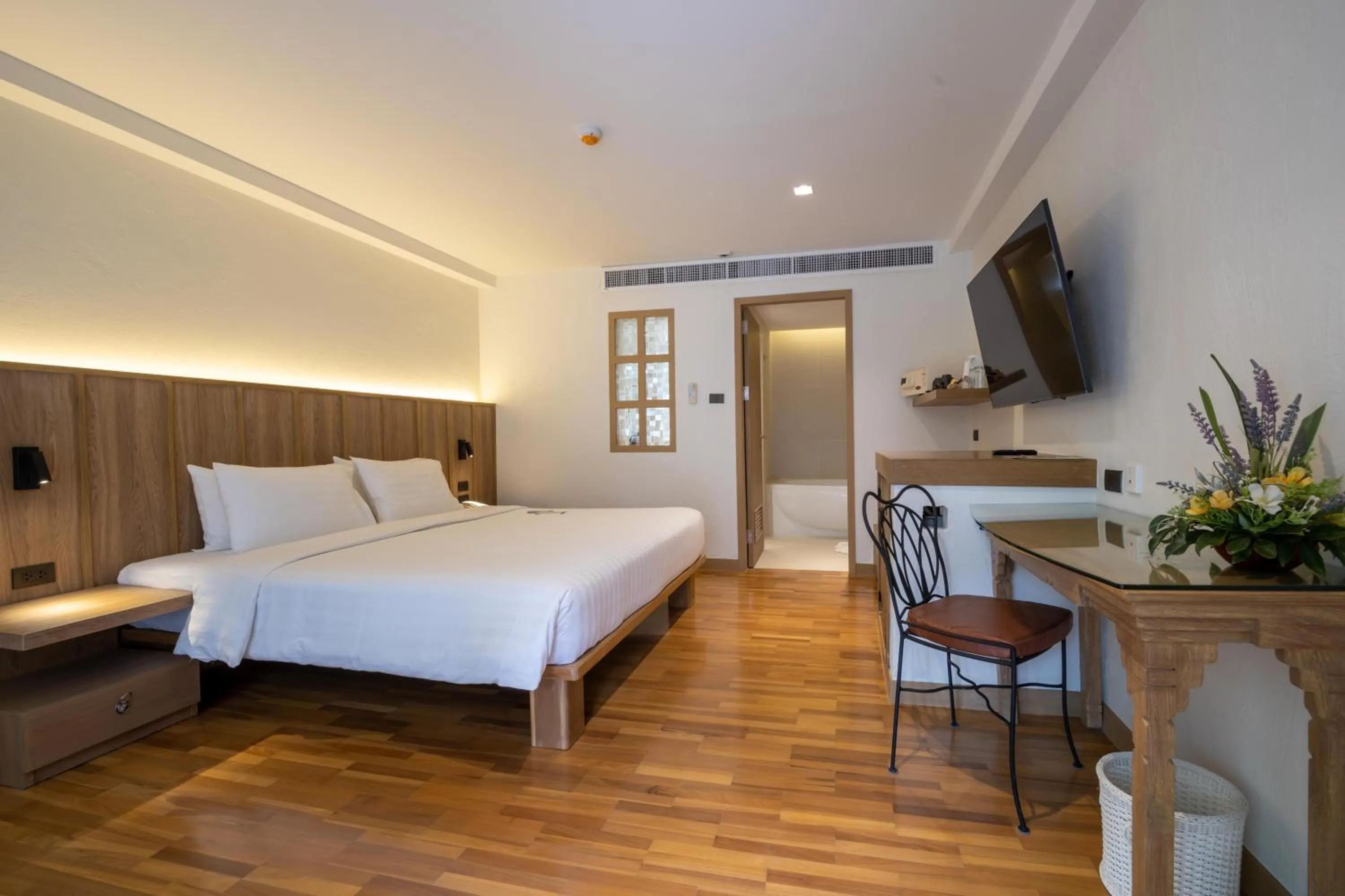 Bed in Baan Samui Resort - SHA Extra Plus