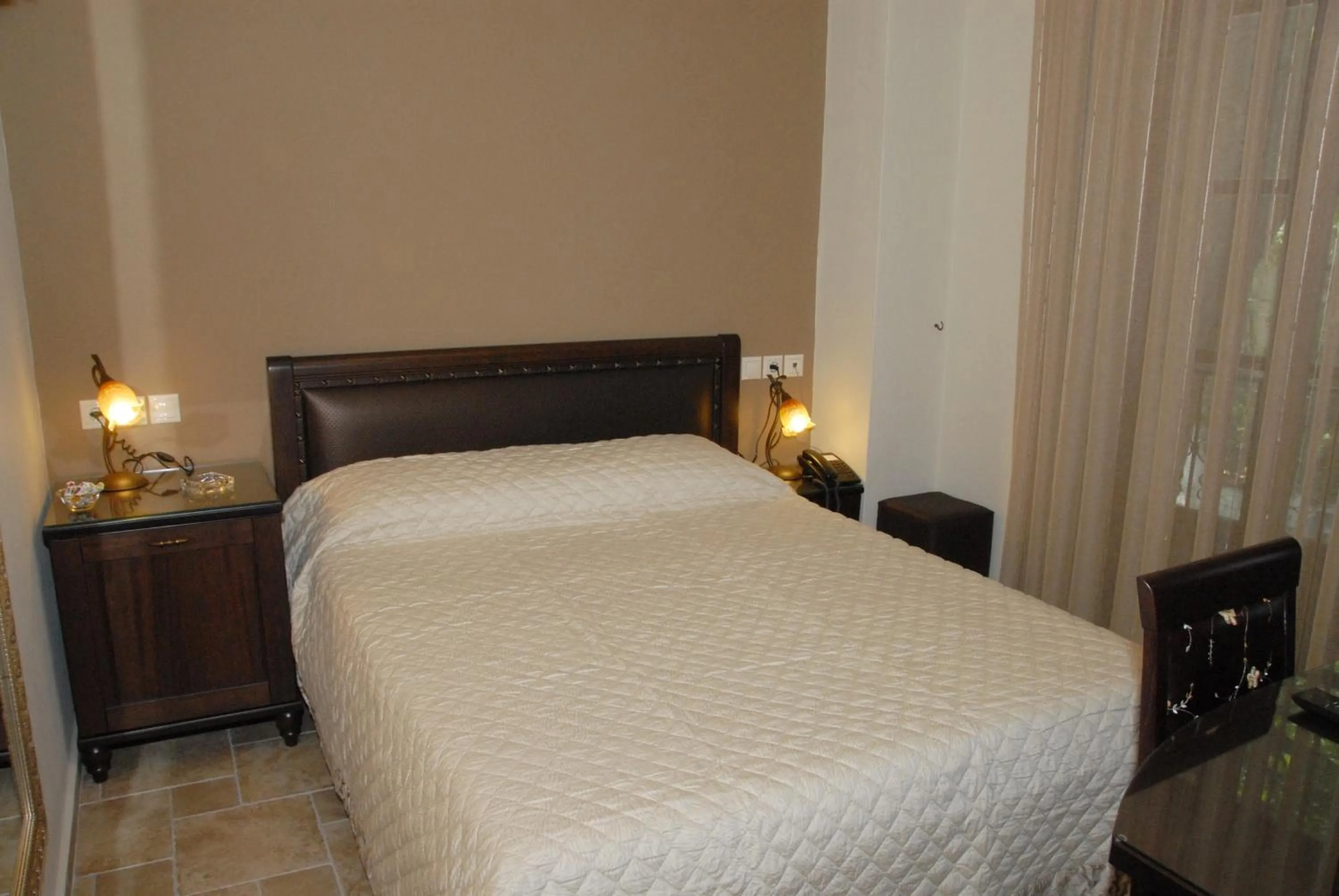 Bed in Hotel Filoxenia